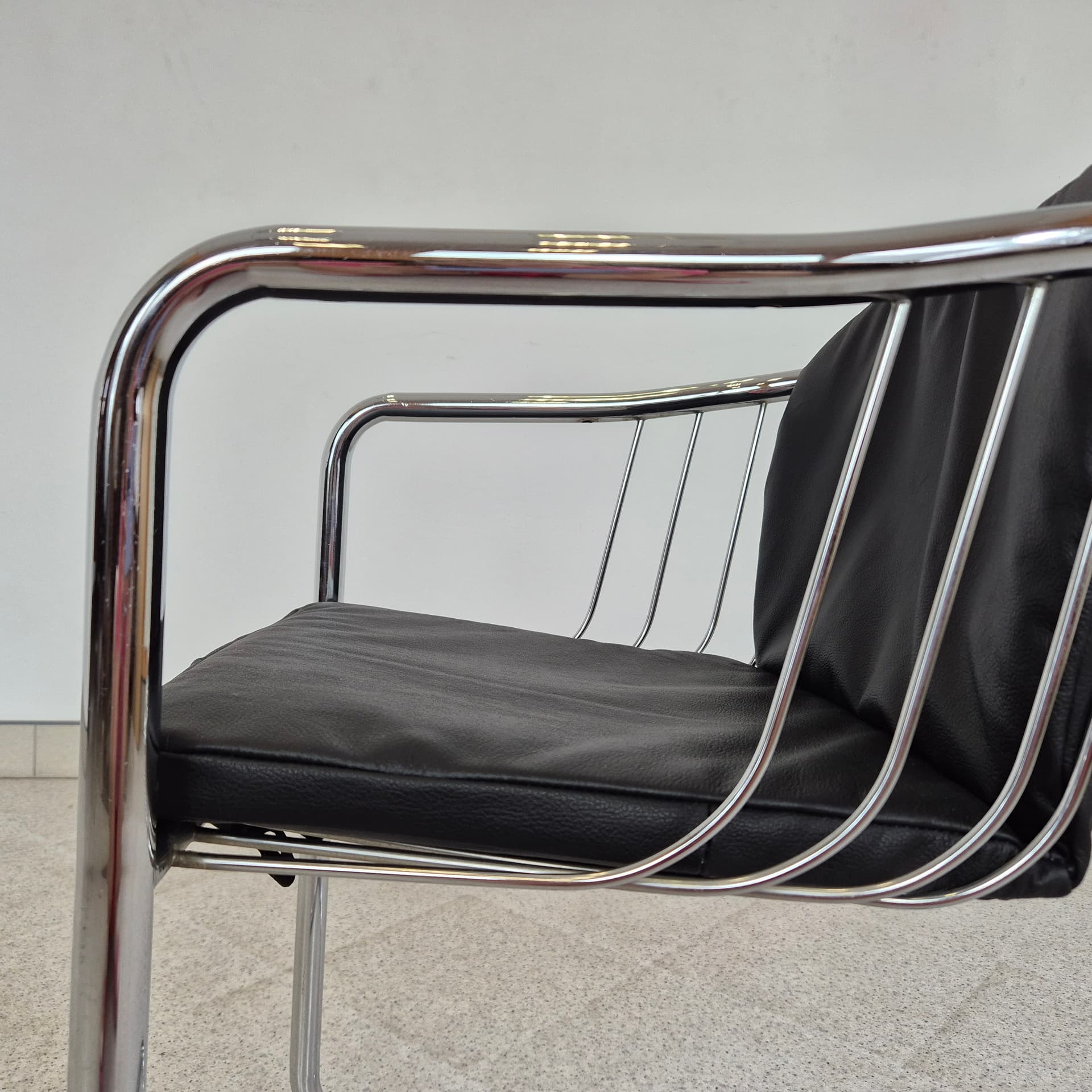 Armchair, black leather, chromed steel, by G. Rinaldi, Italy, 1970s. - 389919