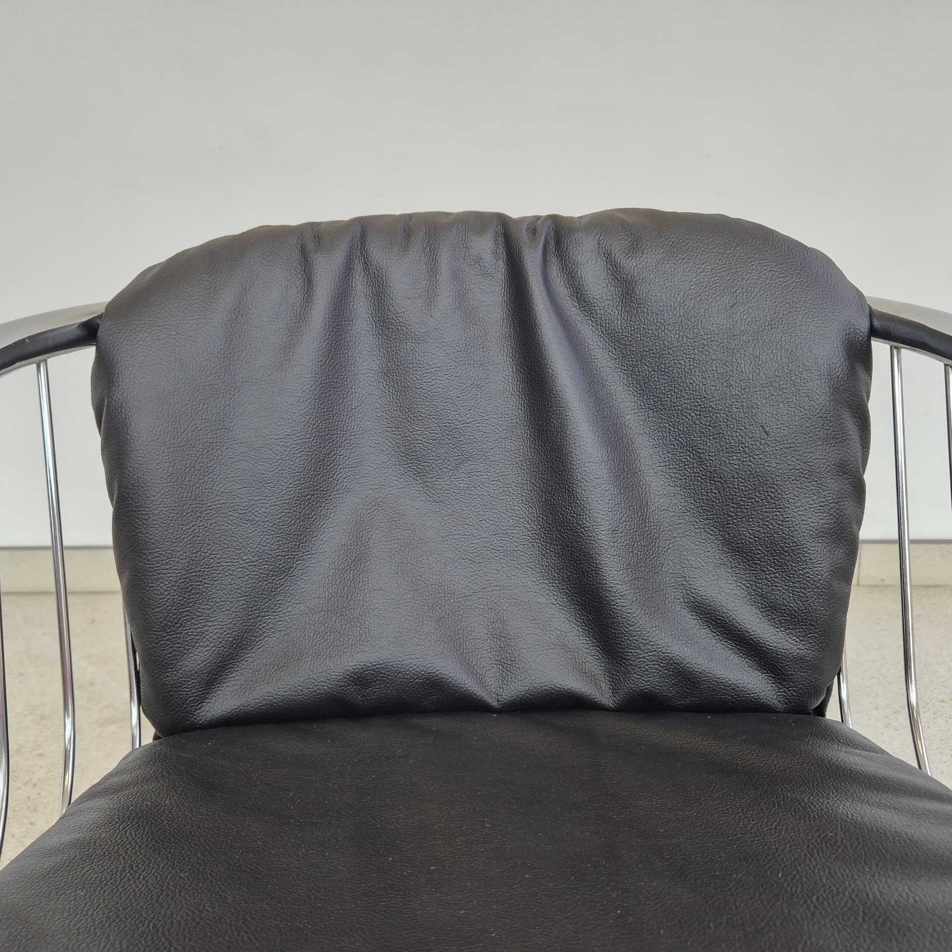Armchair, black leather, chromed steel, by G. Rinaldi, Italy, 1970s. - 389924
