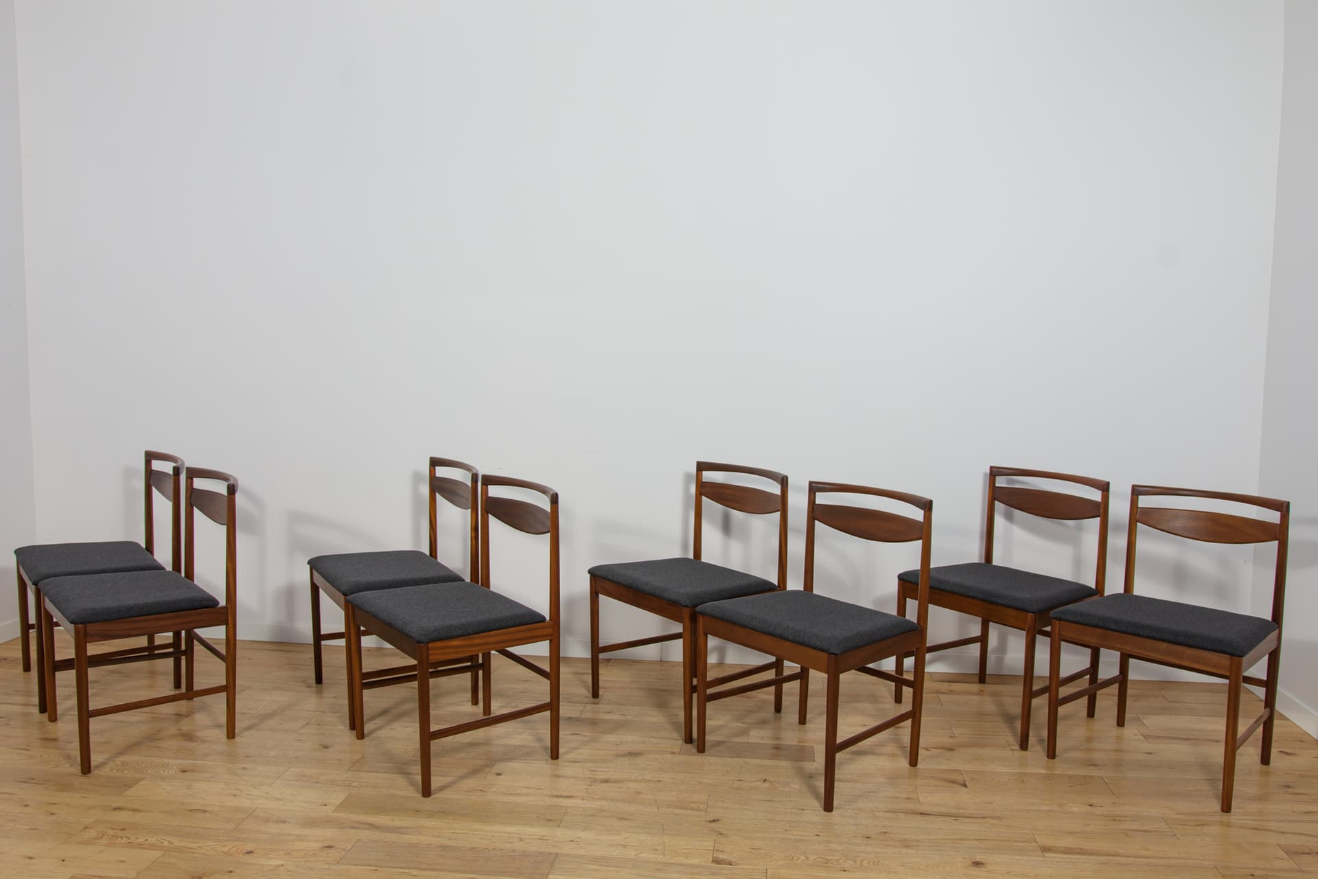 set of eight chairs Model 9513, brown teak, black fabric, by T. Robertson, for A.H. McIntosh & Co., United Kingdom, 1970s - 393530
