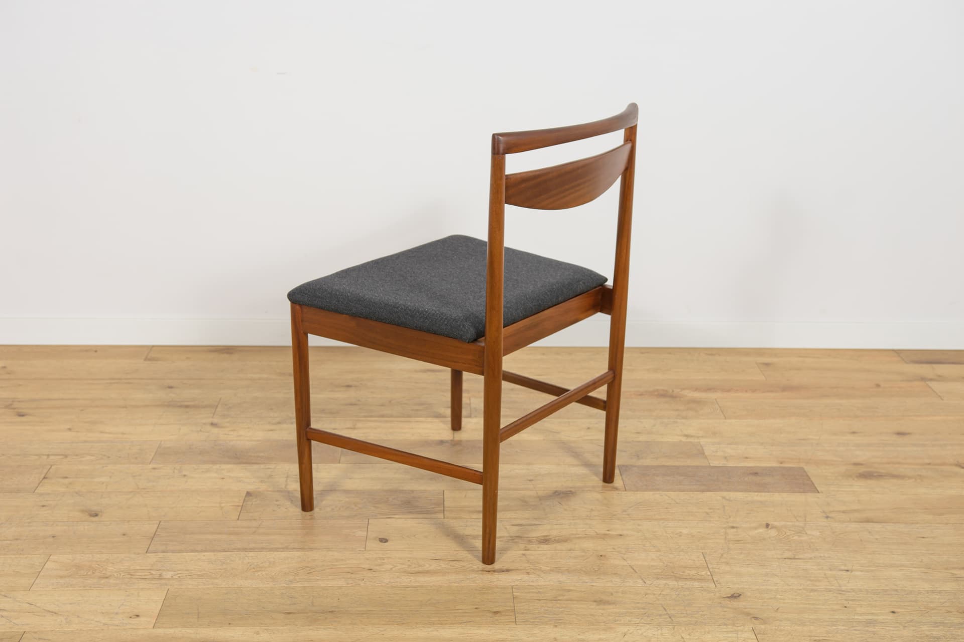 set of eight chairs Model 9513, brown teak, black fabric, by T. Robertson, for A.H. McIntosh & Co., United Kingdom, 1970s - 393535