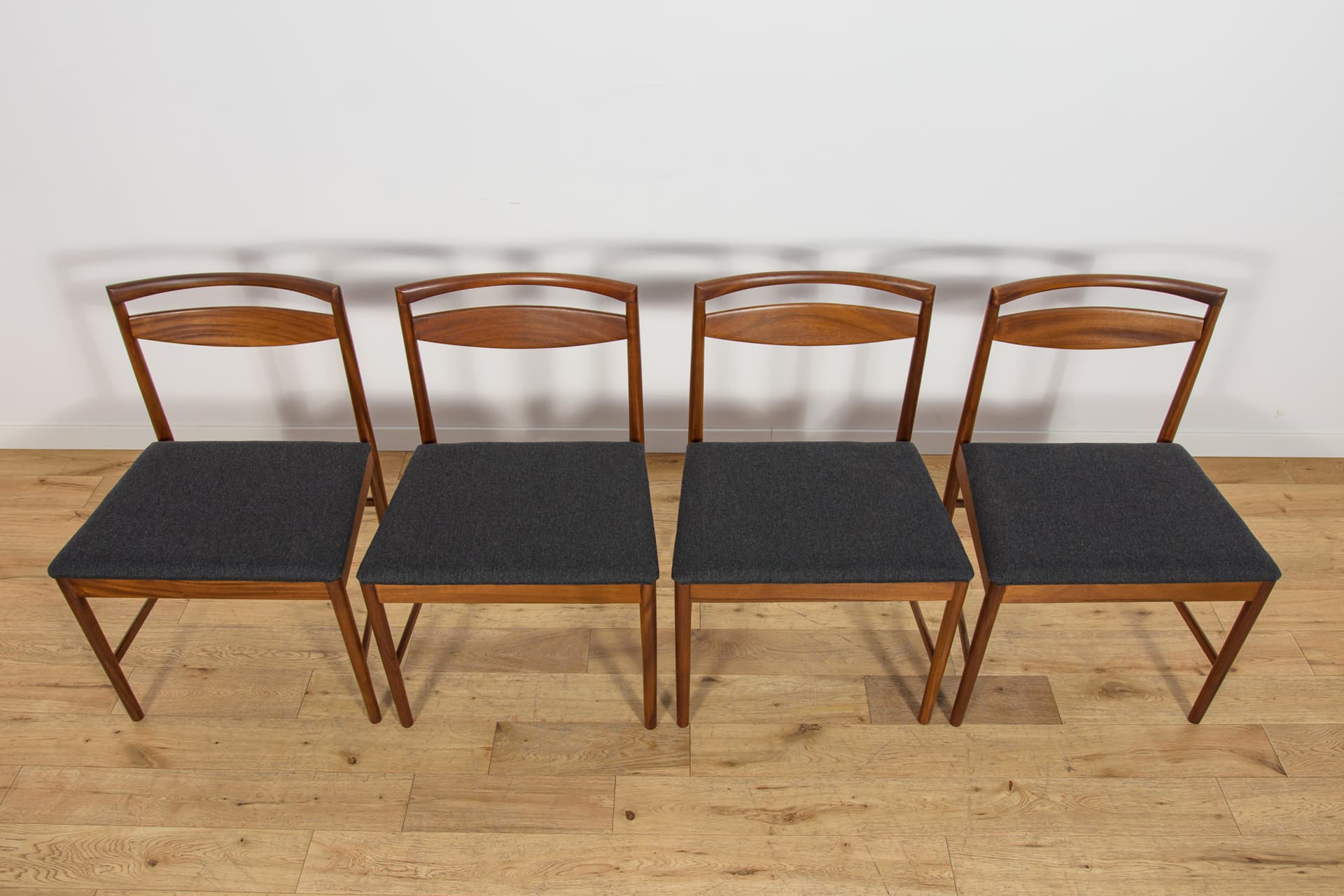 Set of four chairs Model 9513, brown teak, black fabric, by T. Robertson, for A.H. McIntosh & Co., United Kingdom, 1970s. - 393667