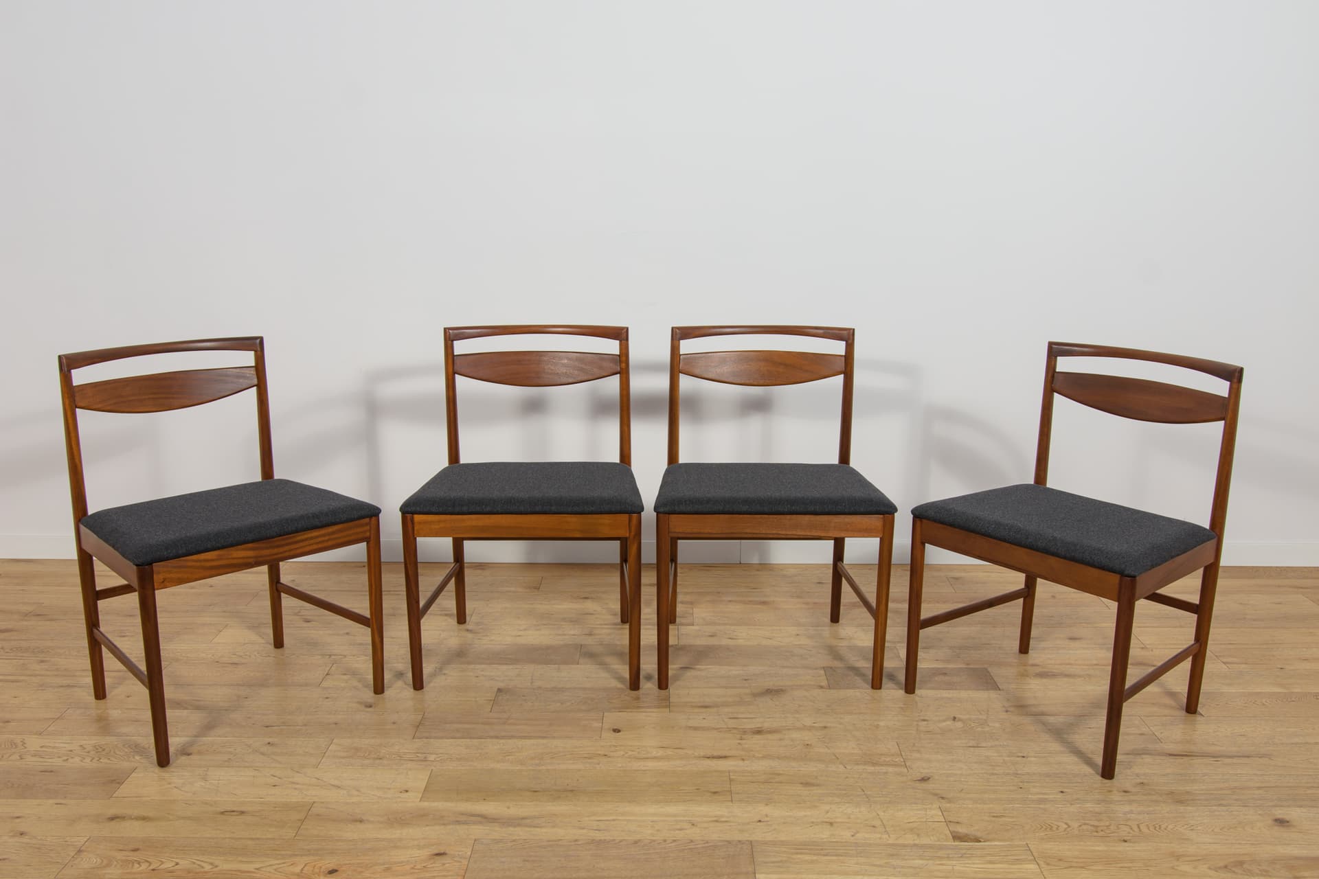Set of four chairs Model 9513, brown teak, black fabric, by T. Robertson, for A.H. McIntosh & Co., United Kingdom, 1970s. - 393668