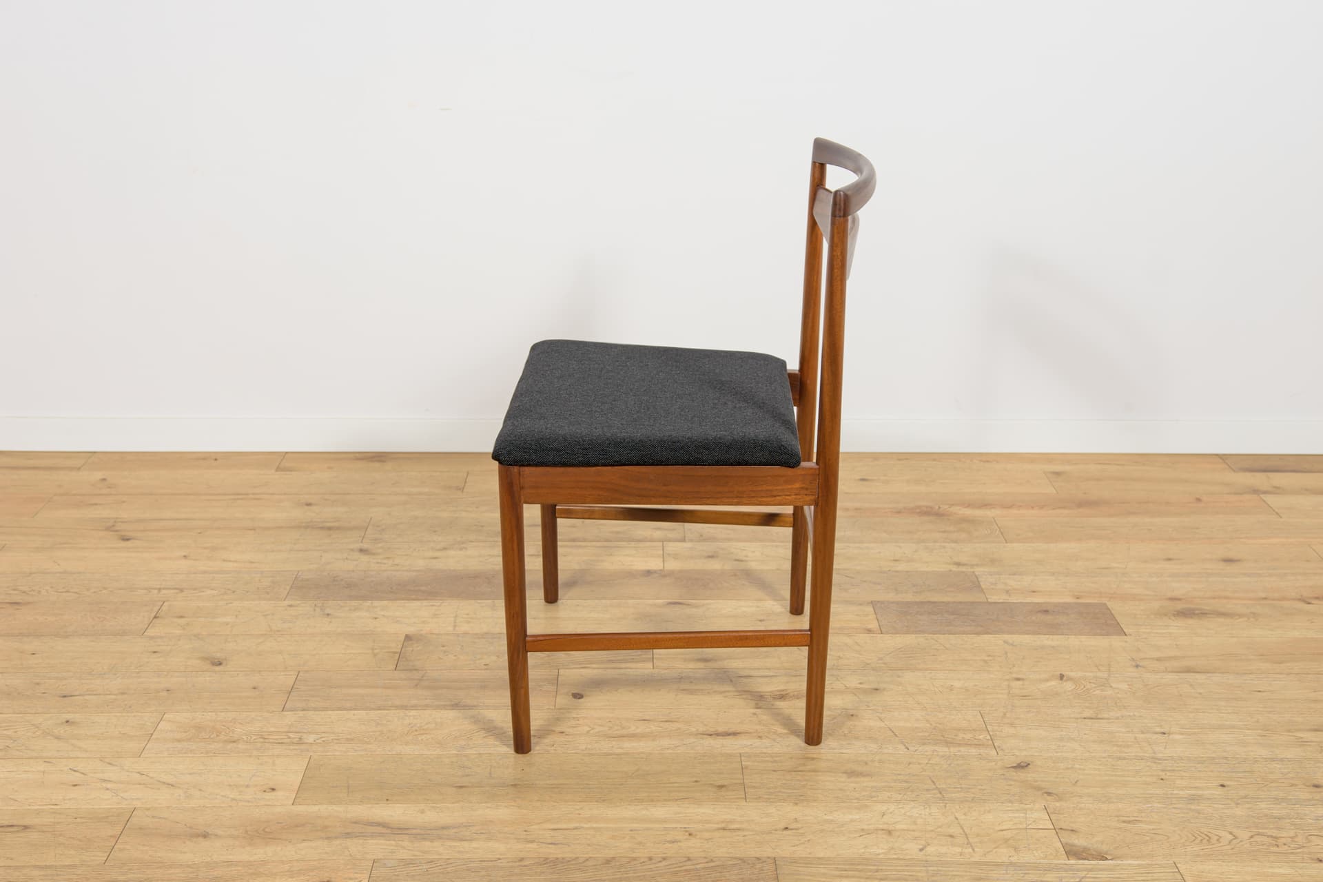 Set of four chairs Model 9513, brown teak, black fabric, by T. Robertson, for A.H. McIntosh & Co., United Kingdom, 1970s. - 393674