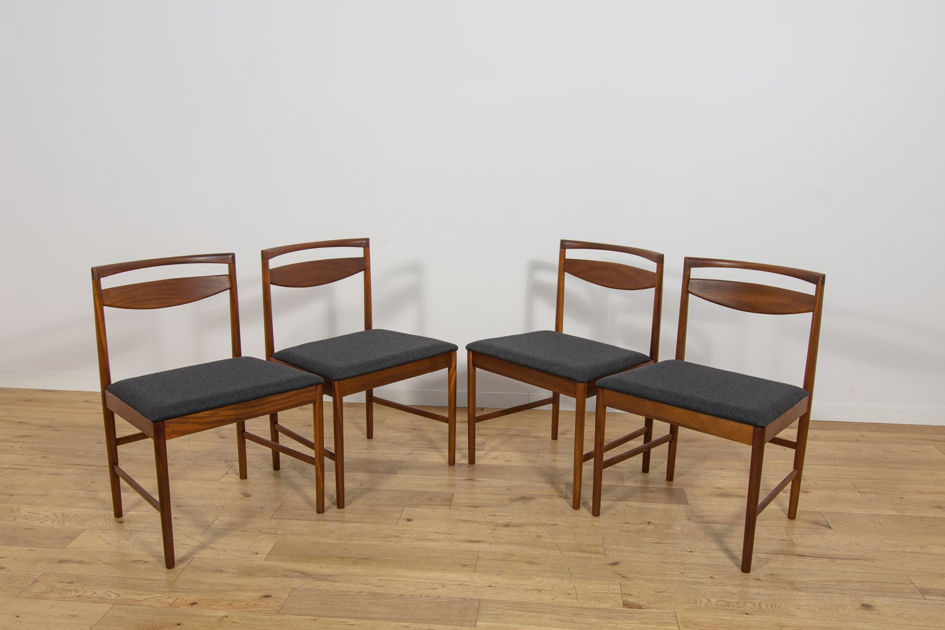 Set of four chairs Model 9513, brown teak, black fabric, by T. Robertson, for A.H. McIntosh & Co., United Kingdom, 1970s. - 393669