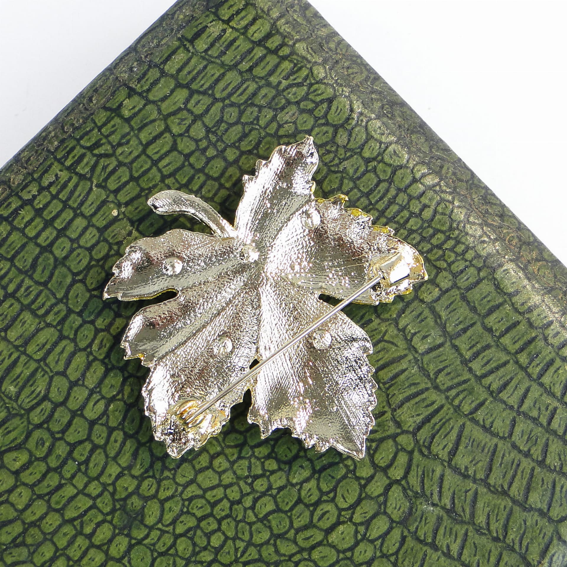 Brooch maple leaf, gold green blue silver, metal enamel cubic zirconia, Jablonex, Czech Republic, 1990s. - 393975