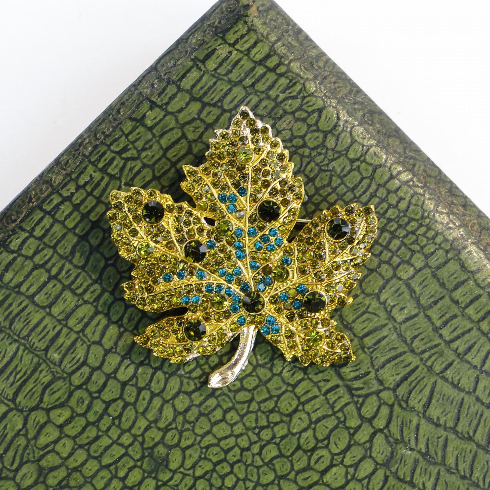 Brooch maple leaf, gold green blue silver, metal enamel cubic zirconia, Jablonex, Czech Republic, 1990s. - 393974