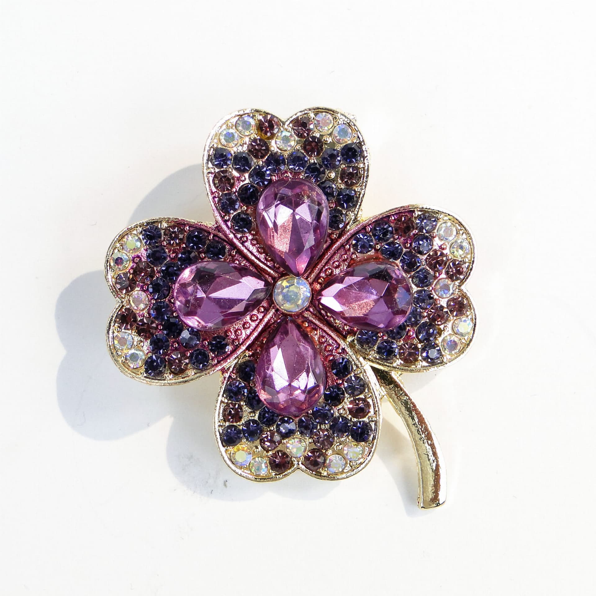 Brooch Four-Leaf Clover, purple glass, gold metal, Jablonex, Czech Republic, 1990s. - 393982