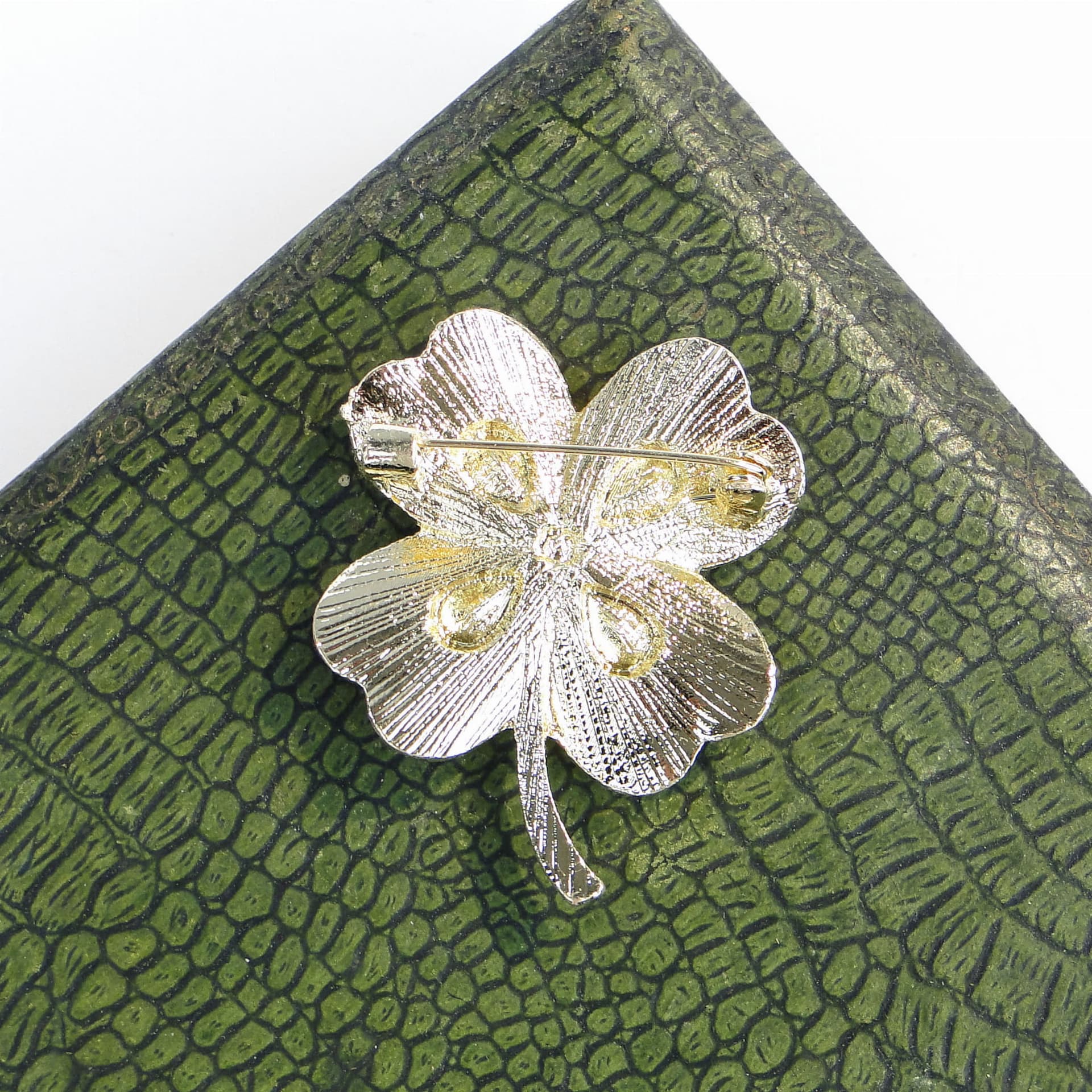 Brooch Four-Leaf Clover, purple glass, gold metal, Jablonex, Czech Republic, 1990s. - 393981