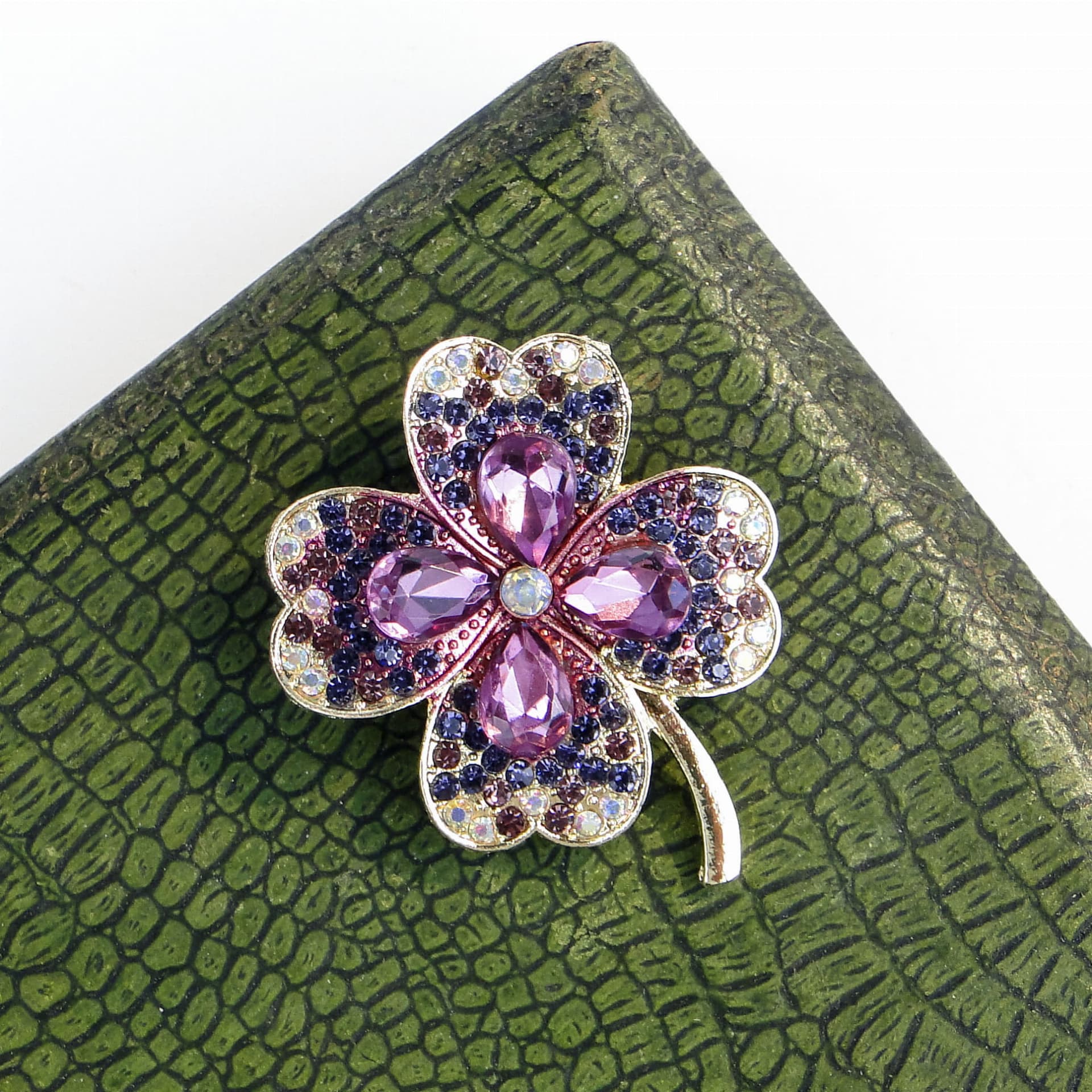 Brooch Four-Leaf Clover, purple glass, gold metal, Jablonex, Czech Republic, 1990s. - 393983
