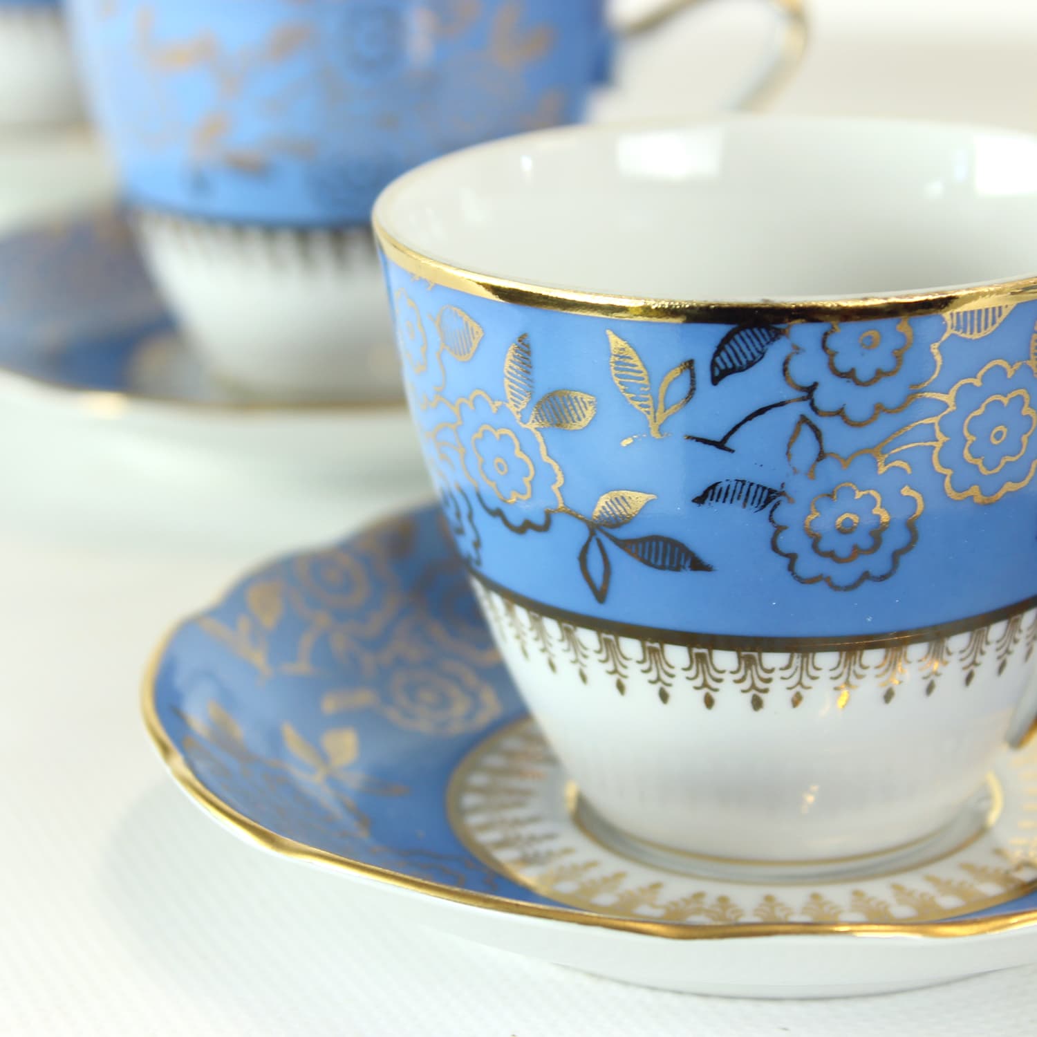 Zestaw sześciu filiżanek i spodków, porcelana niebieska, złocona, Stará Role, Czechosłowacja, lata 50. - 394386