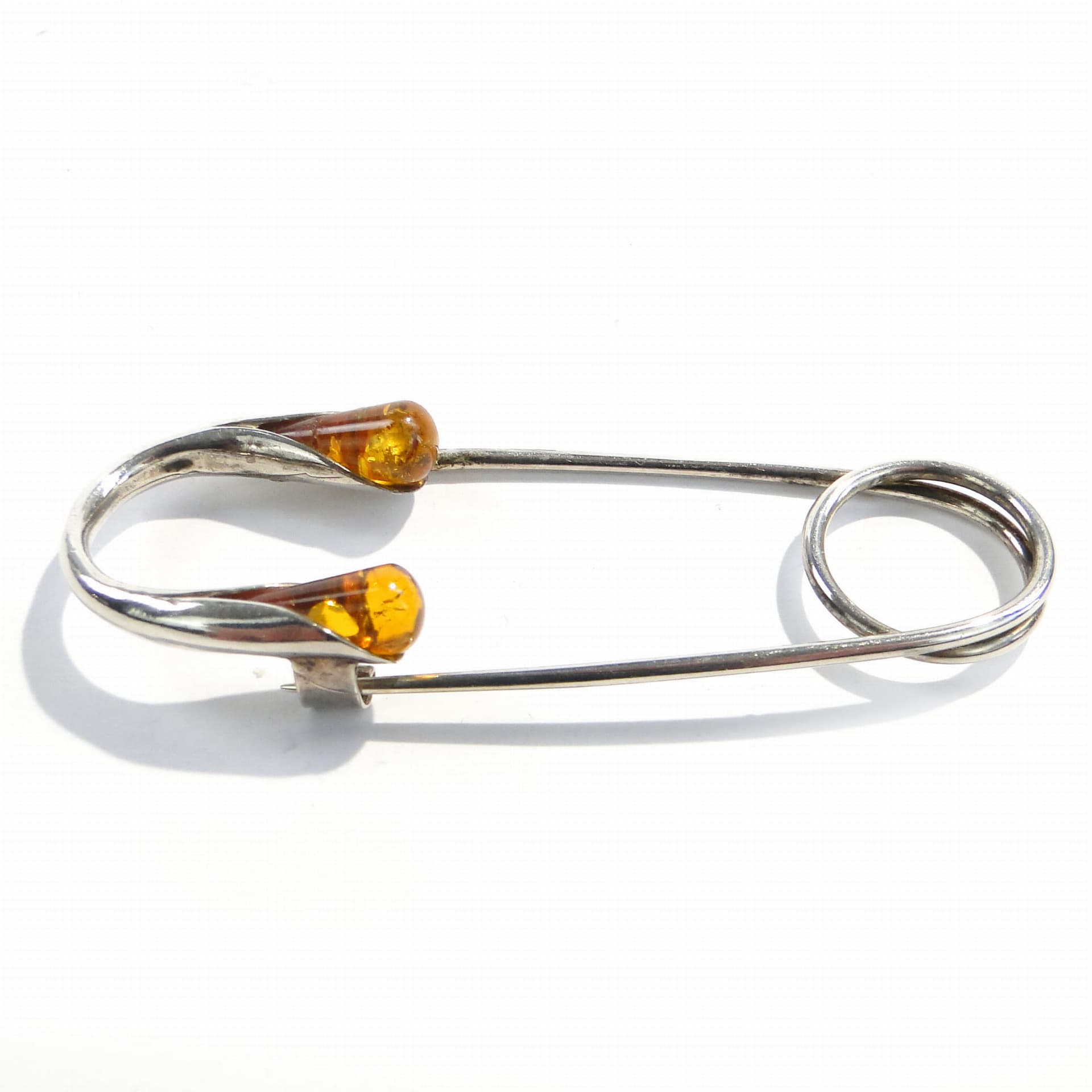 Safety pin, silver silver, yellow amber, Poland, 1970s. - 394480