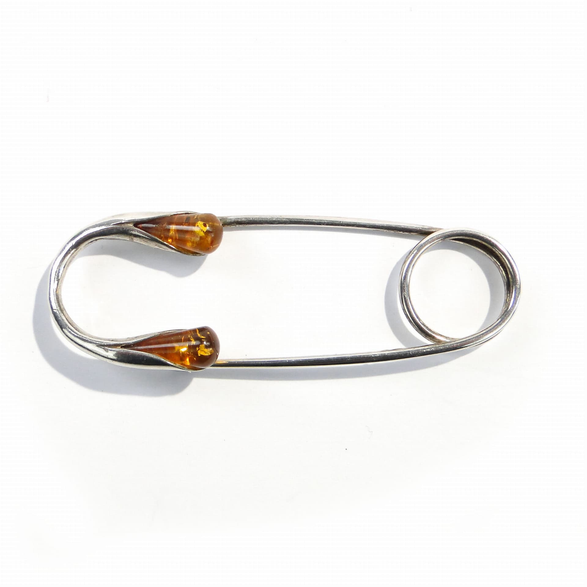Safety pin, silver silver, yellow amber, Poland, 1970s. - 394481
