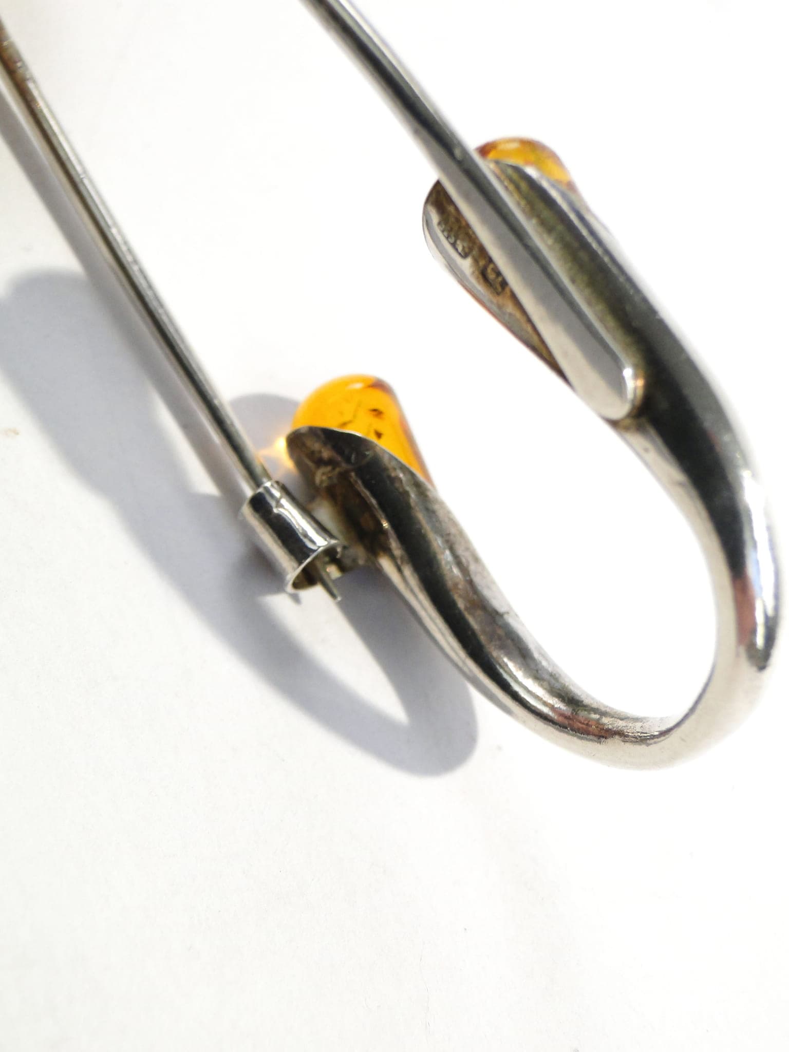 Safety pin, silver silver, yellow amber, Poland, 1970s. - 394484