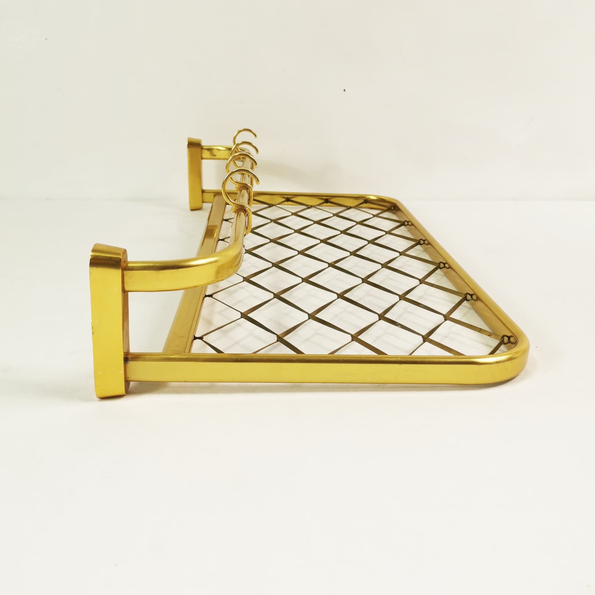 Wall-mounted coat rack Art Deco, gold aluminium, black plastic, Germany, 1960s. - 394577