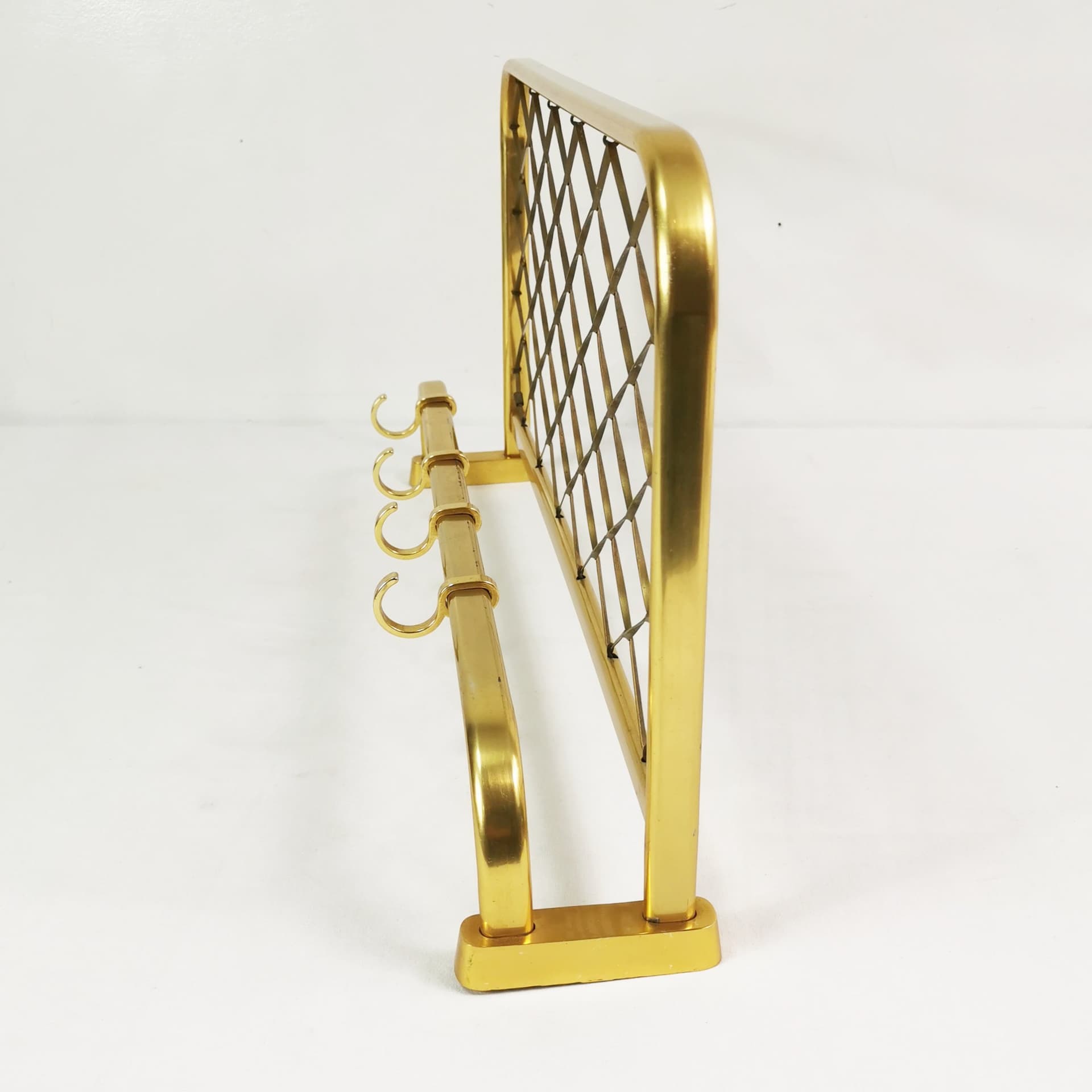 Wall-mounted coat rack Art Deco, gold aluminium, black plastic, Germany, 1960s. - 394573