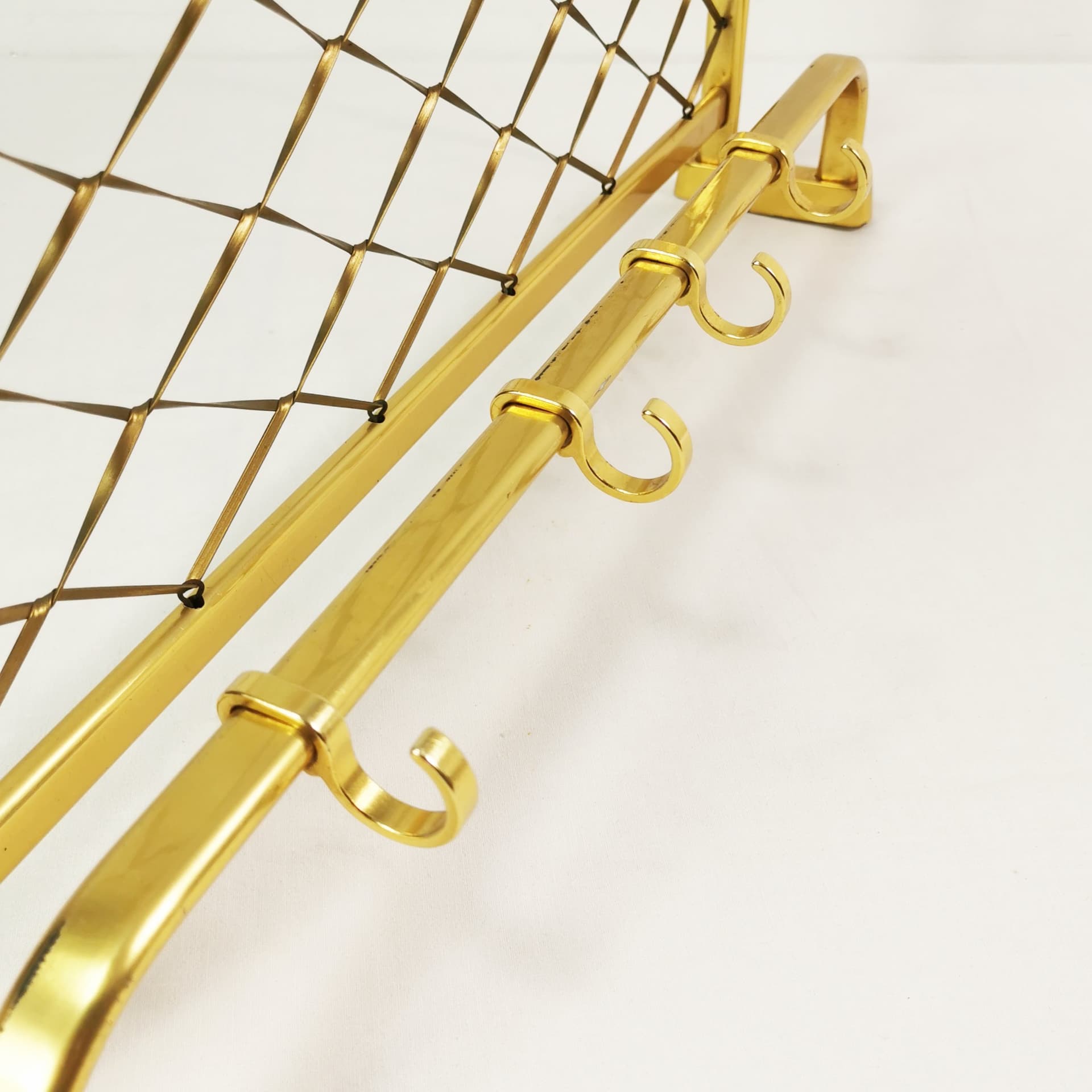 Wall-mounted coat rack Art Deco, gold aluminium, black plastic, Germany, 1960s. - 394582