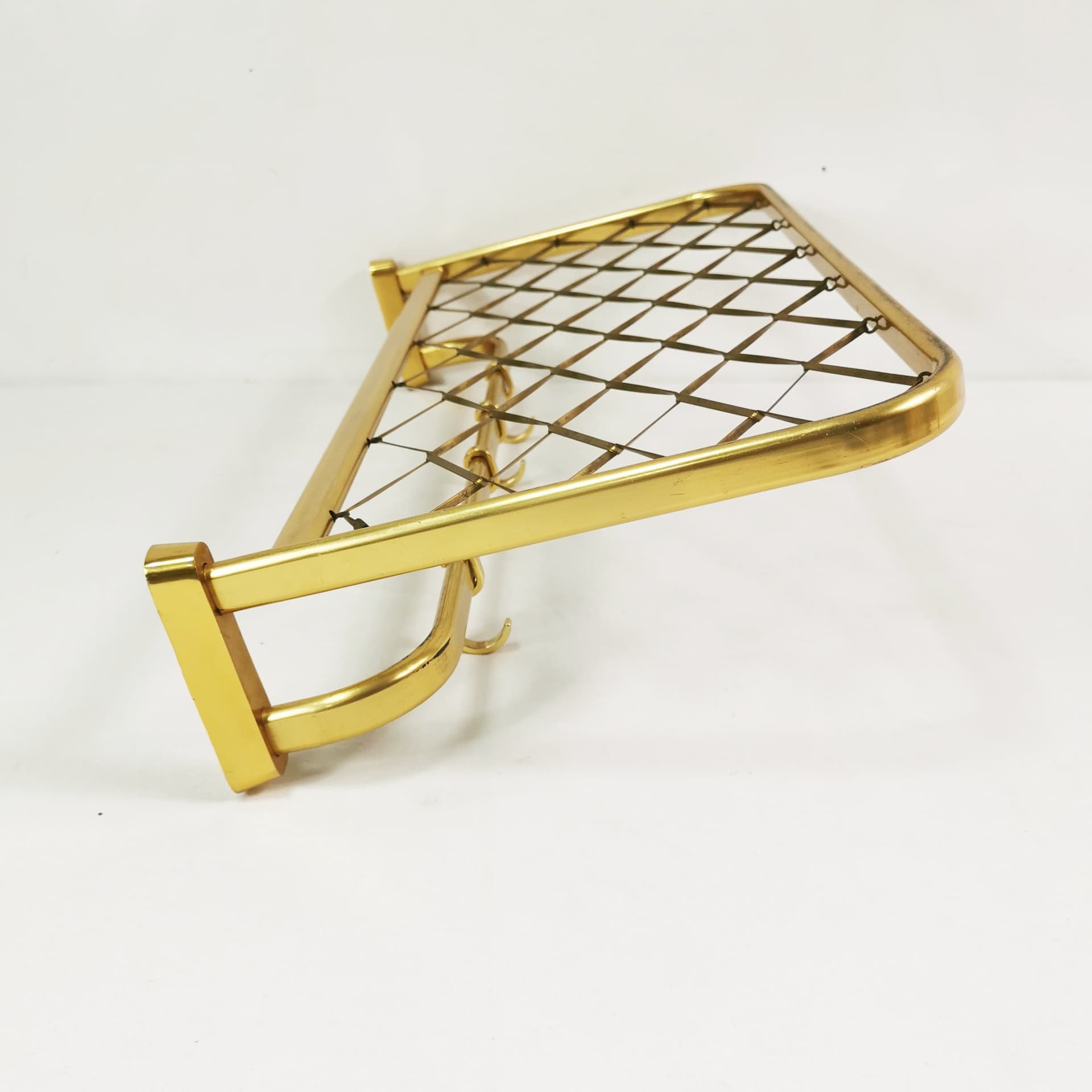Wall-mounted coat rack Art Deco, gold aluminium, black plastic, Germany, 1960s. - 394576