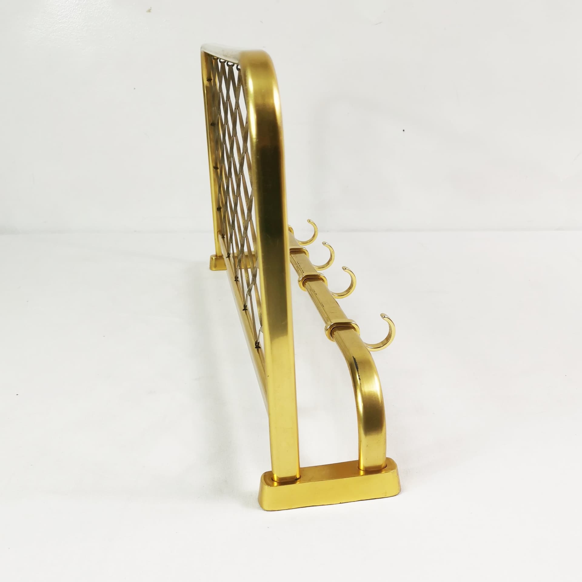 Wall-mounted coat rack Art Deco, gold aluminium, black plastic, Germany, 1960s. - 394574