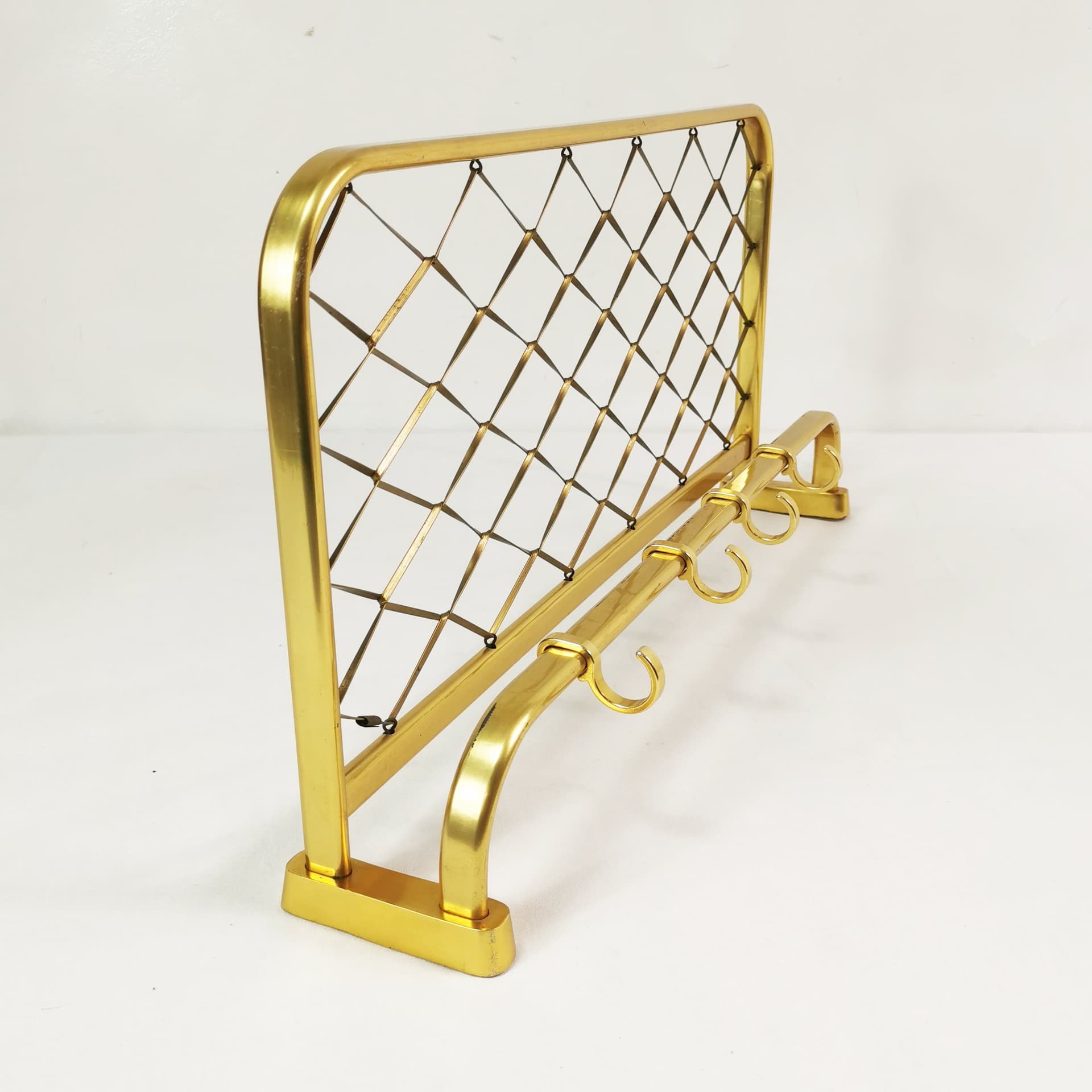 Wall-mounted coat rack Art Deco, gold aluminium, black plastic, Germany, 1960s. - 394579