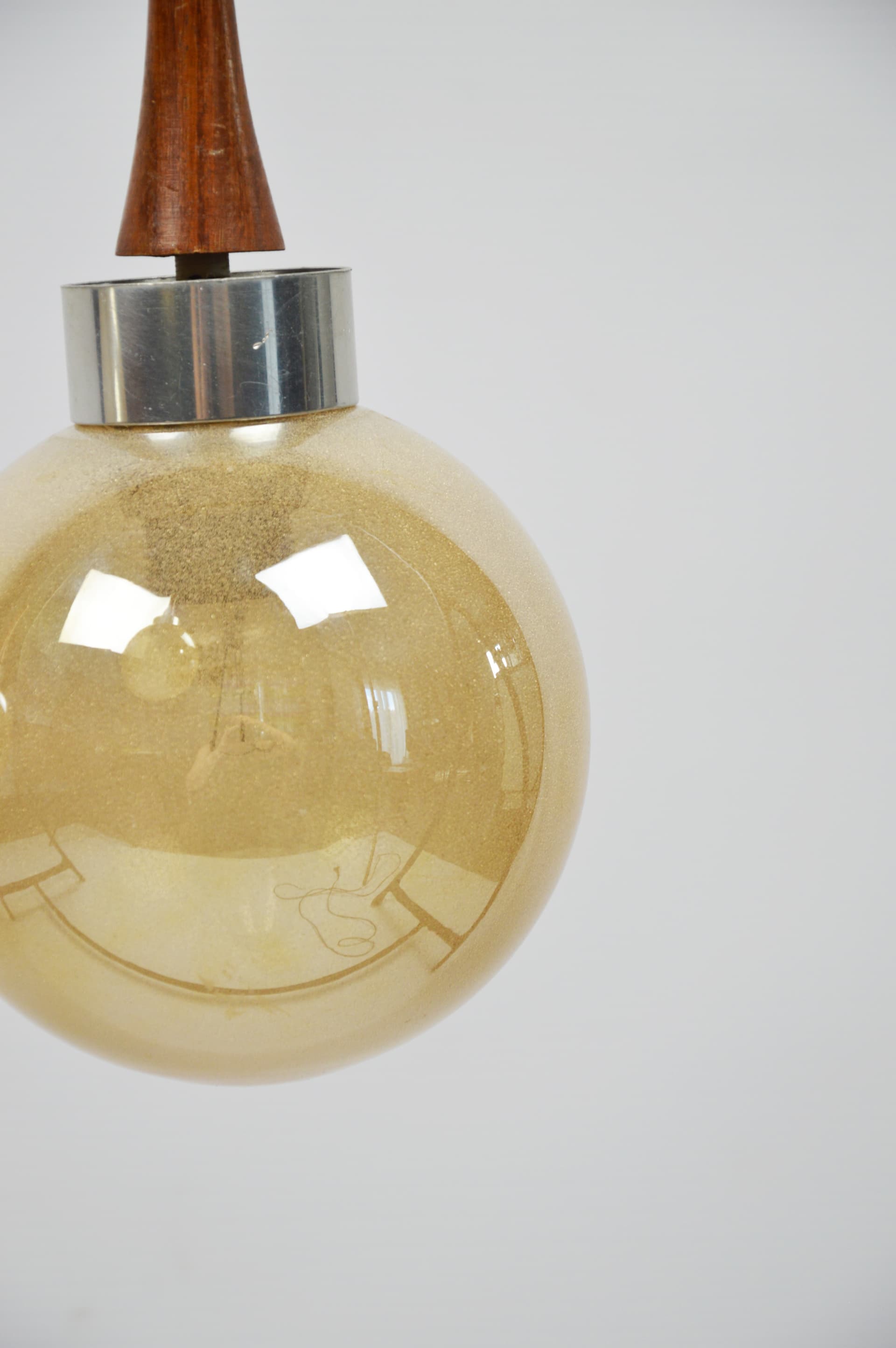 Cascading pendant lamp, yellow glass, brown wood, silver metal, 1970s. - 397539