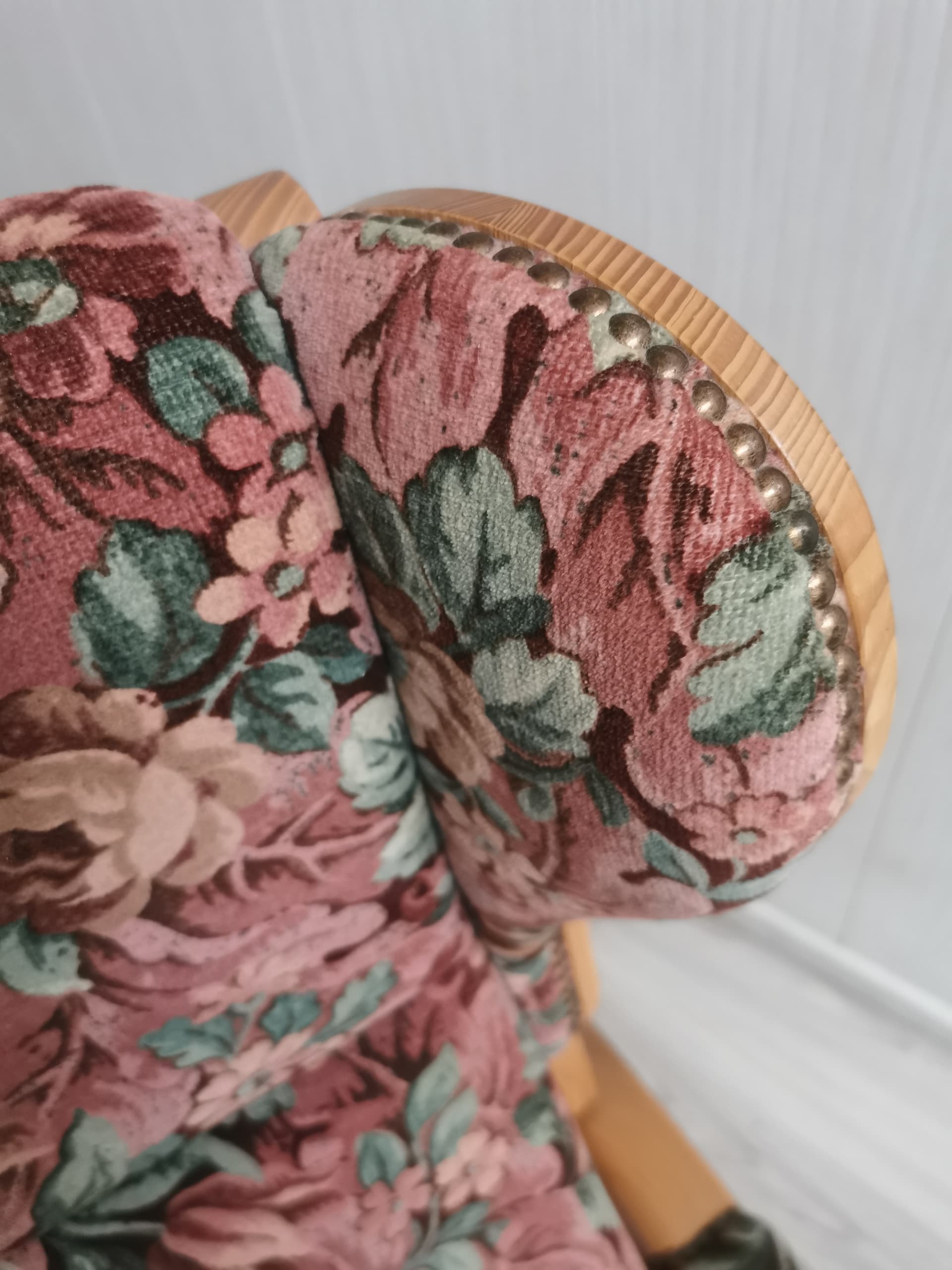 Reclining wingback armchair, pink floral fabric, light brown wood, 1990s. - 400975