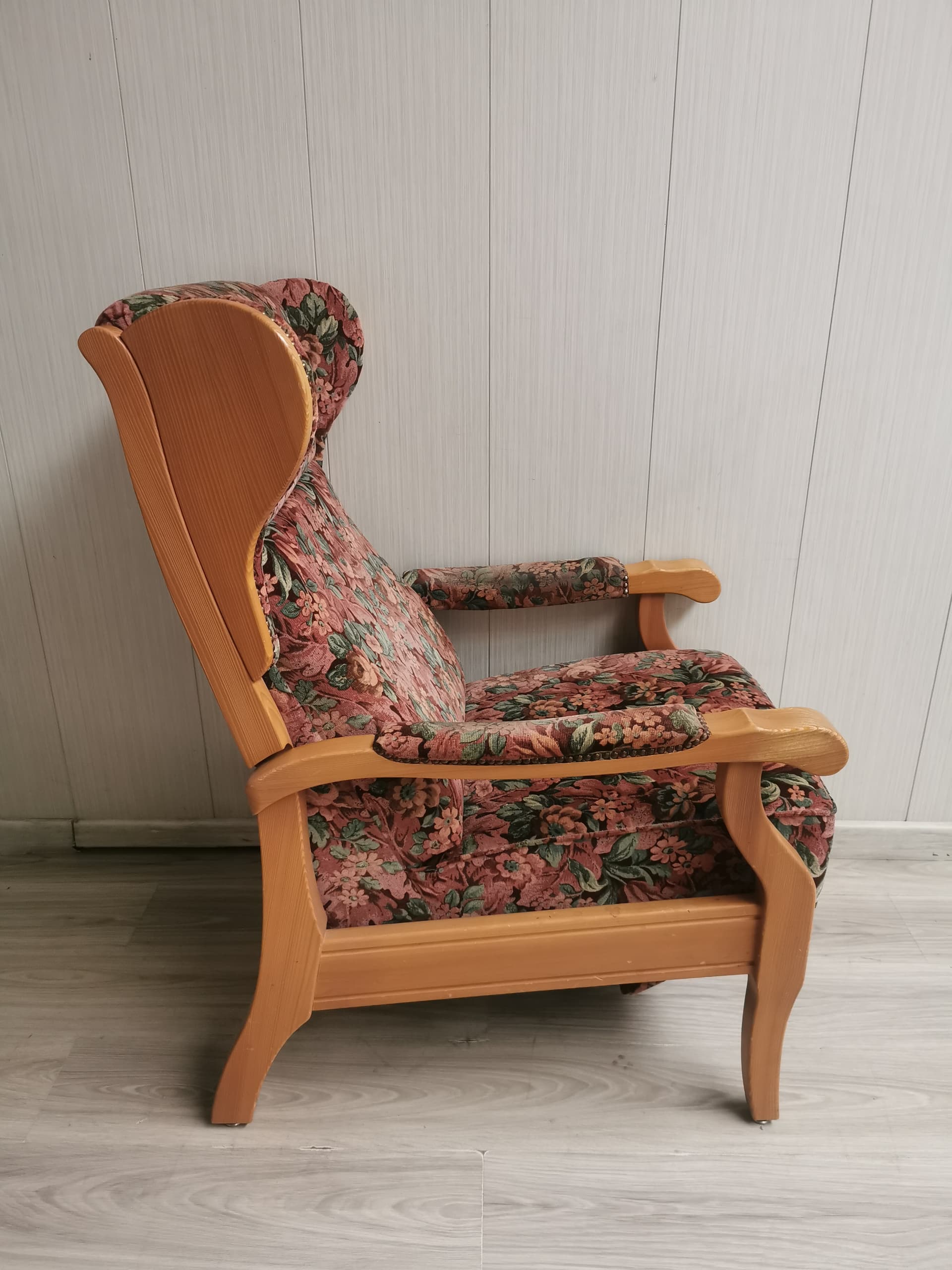 Reclining wingback armchair, pink floral fabric, light brown wood, 1990s. - 400971