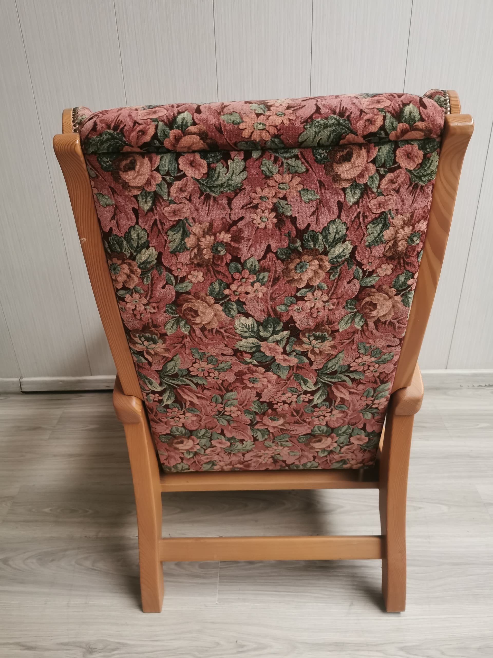 Reclining wingback armchair, pink floral fabric, light brown wood, 1990s. - 400973