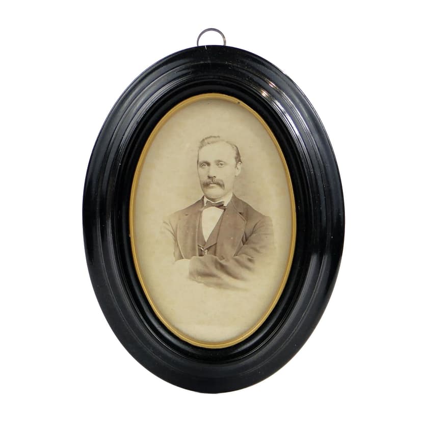 Elliptical Photo Frame, black and gilt wood, Germany, early 20th c.