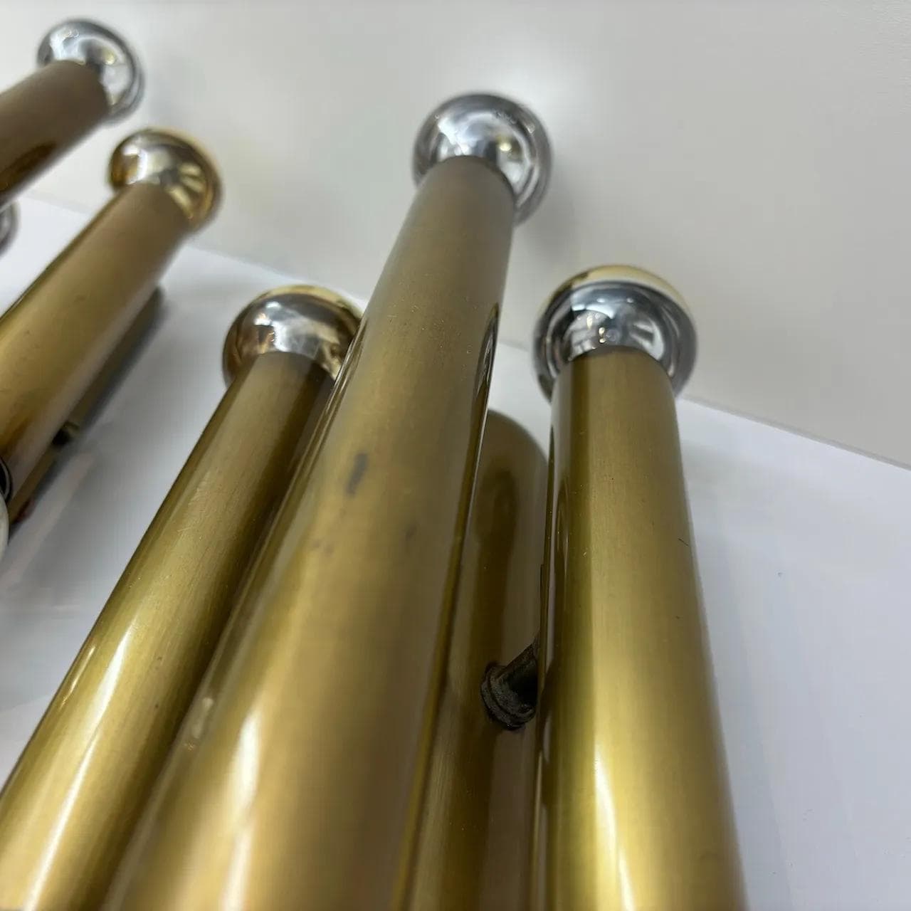 Pair of brutalist wall sconces, golden brass, Germany, 1980s. - 33548