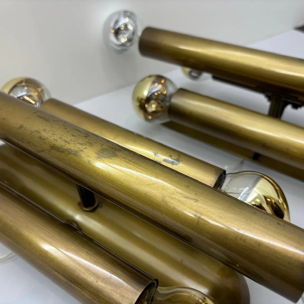 Pair of brutalist wall sconces, golden brass, Germany, 1980s. - 33546