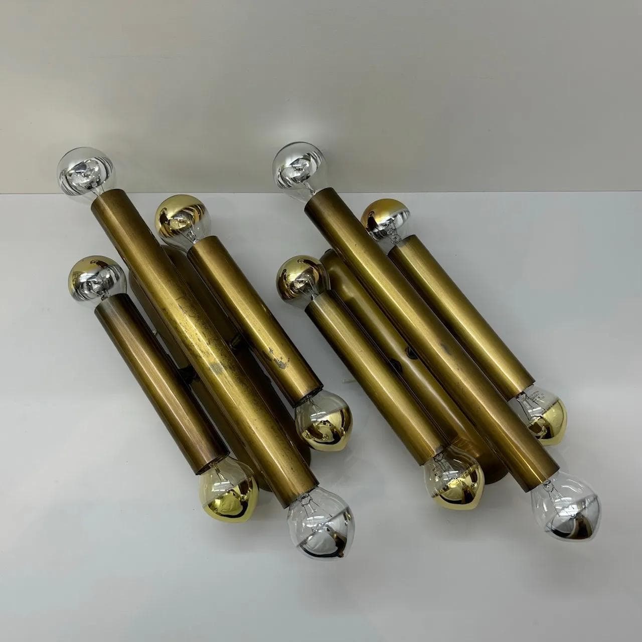 Pair of brutalist wall sconces, golden brass, Germany, 1980s. - 33545