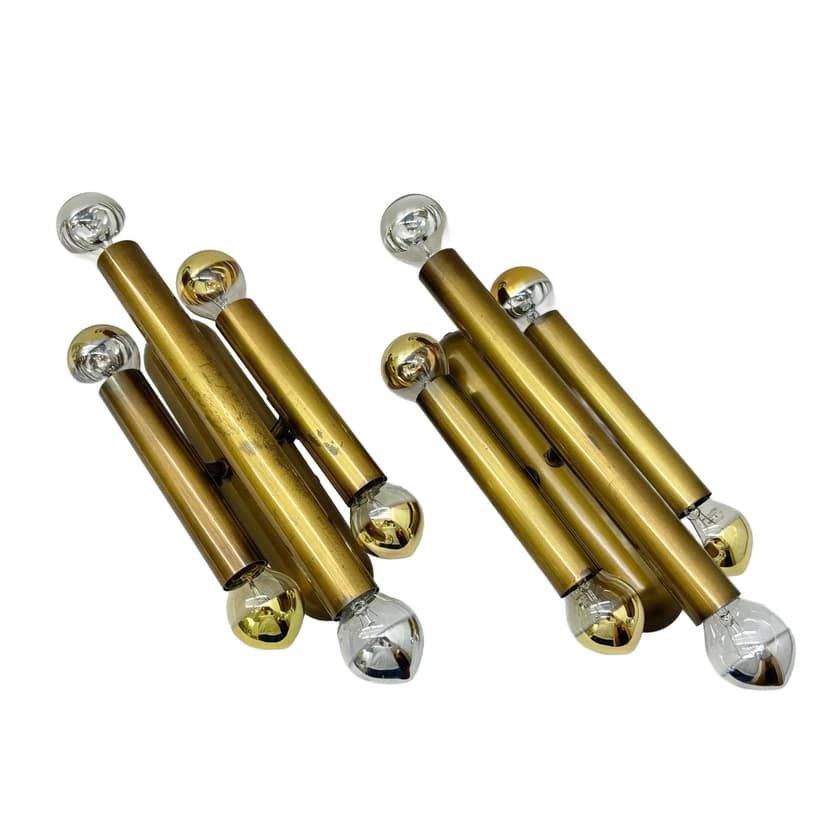 Pair of brutalist wall sconces, golden brass, Germany, 1980s.