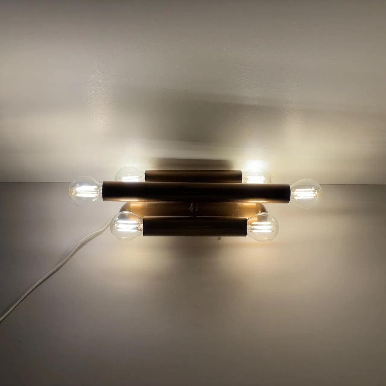 Pair of brutalist wall sconces, golden brass, Germany, 1980s. - 33544