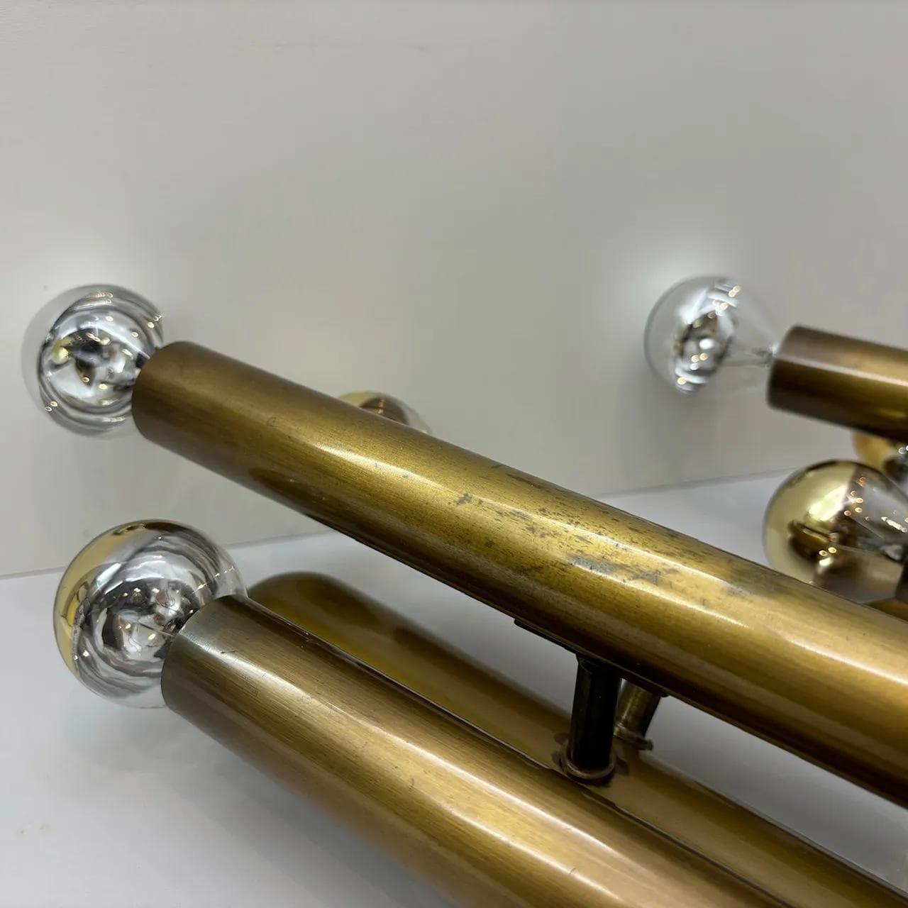 Pair of brutalist wall sconces, golden brass, Germany, 1980s. - 33549