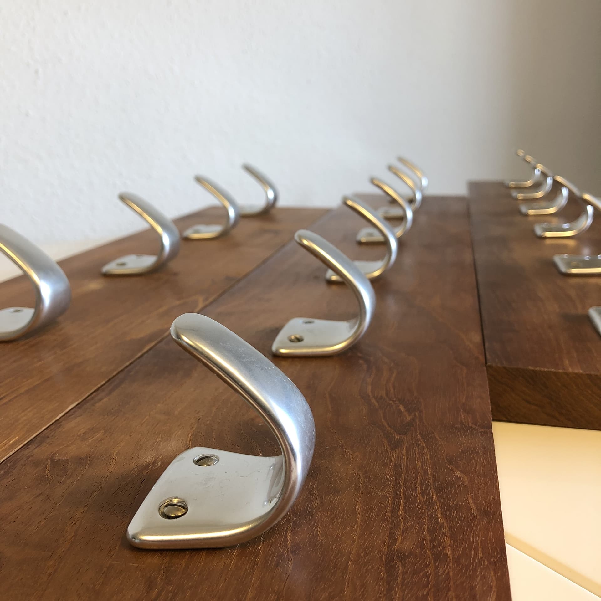 Wall-mounted coat rack, brown teak, silver aluminium, Germany, 1970s. - 33672