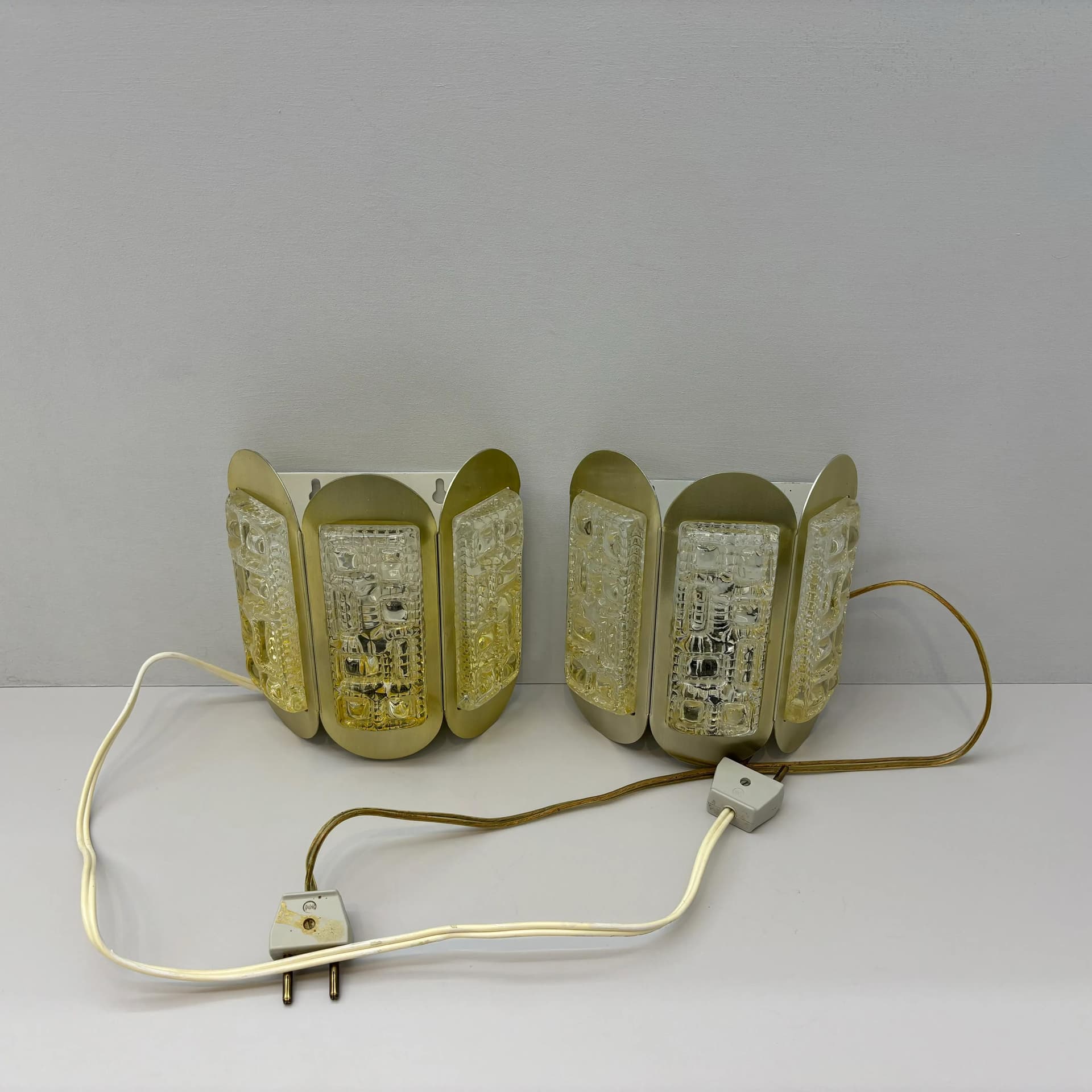 Pair of wall sconces, Vitrika, amber glass, gold aluminium, Denmark, 1960s. - 33949