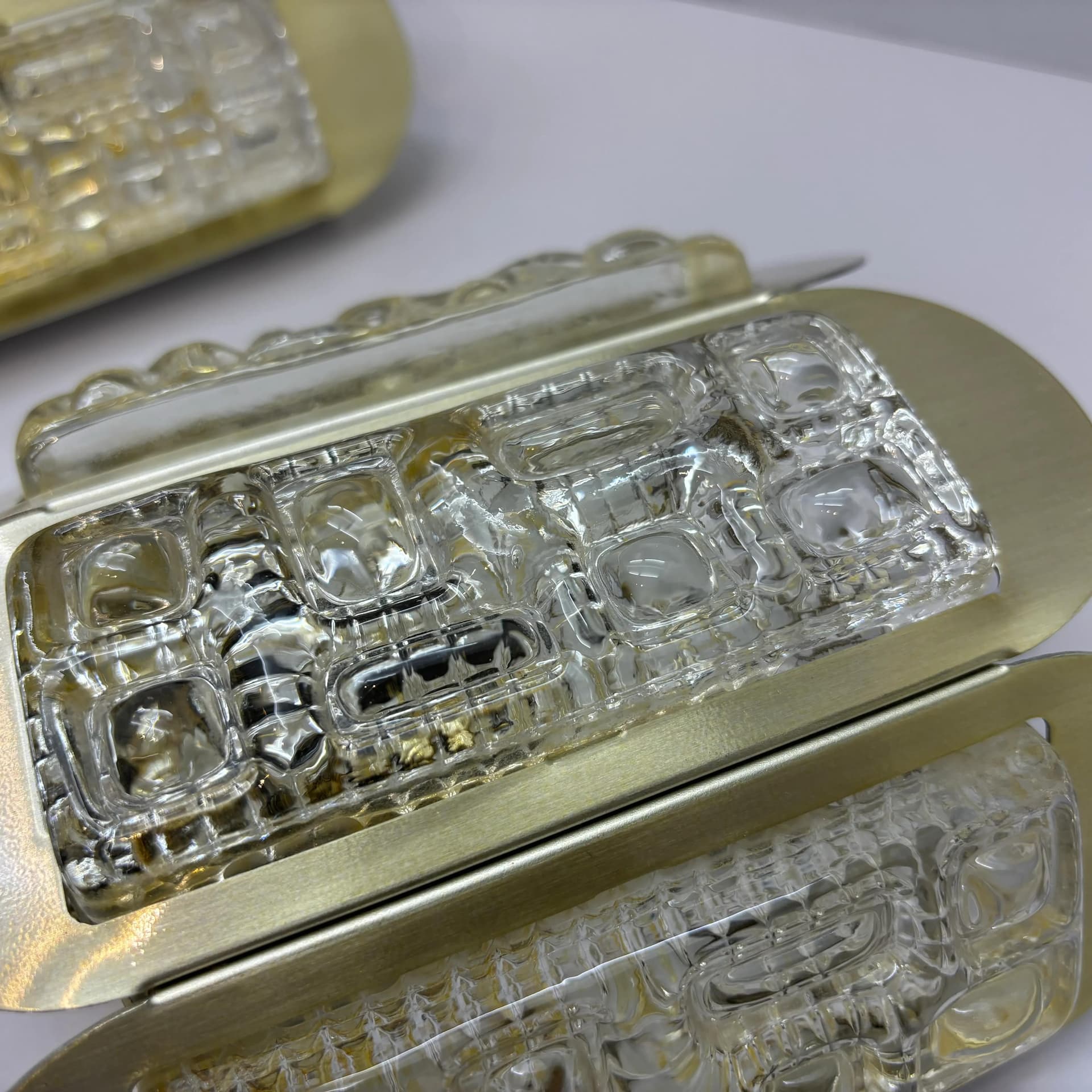 Pair of wall sconces, Vitrika, amber glass, gold aluminium, Denmark, 1960s. - 33954