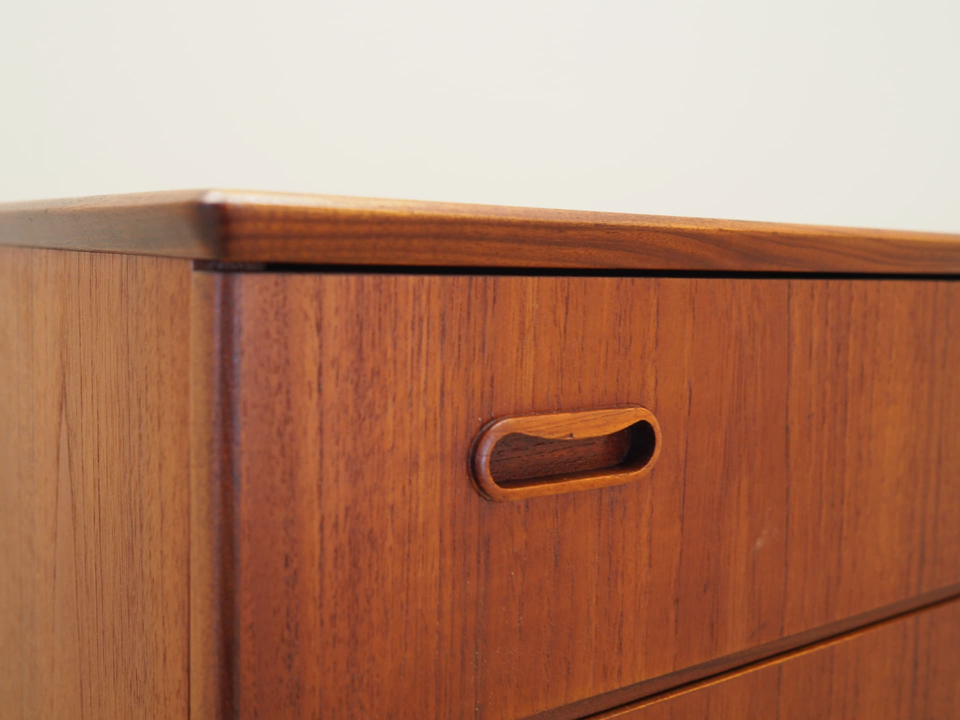 Chest of drawers, teak, orange, Denmark, 1970s. - 57491