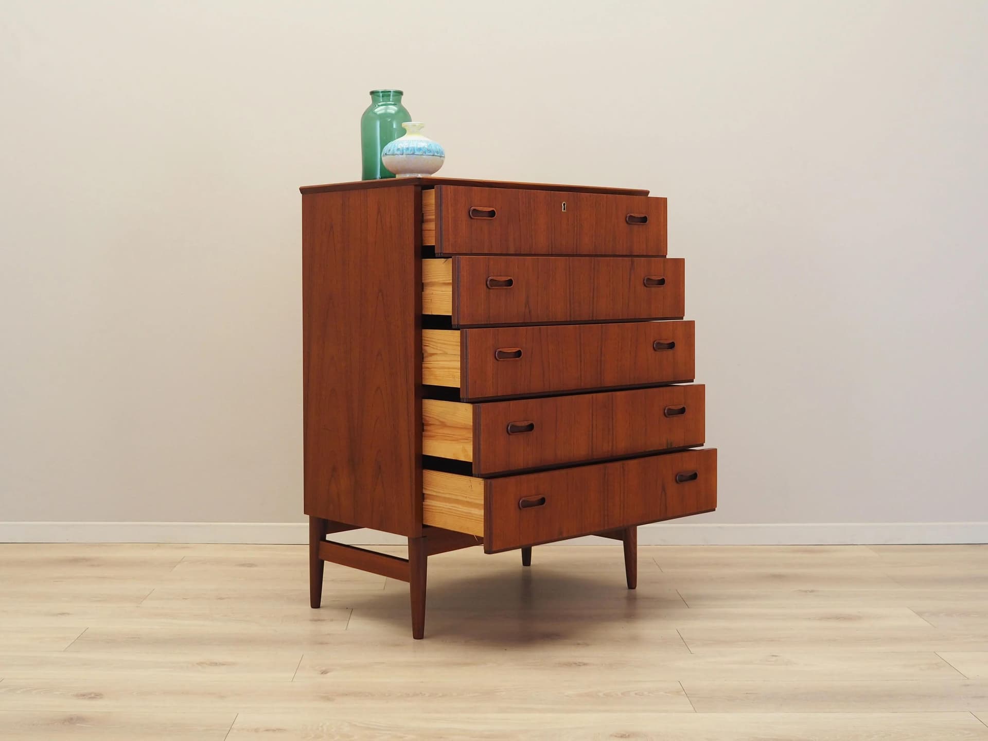 Chest of drawers, teak, orange, Denmark, 1970s. - 37172
