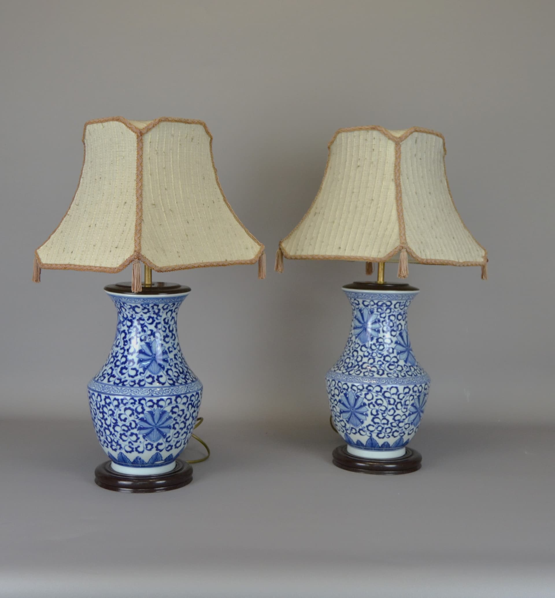 Pair of oriental table lamps, cobalt blue and white ceramic, dark brown wood, ivory fabric shade, 1950s. - 266