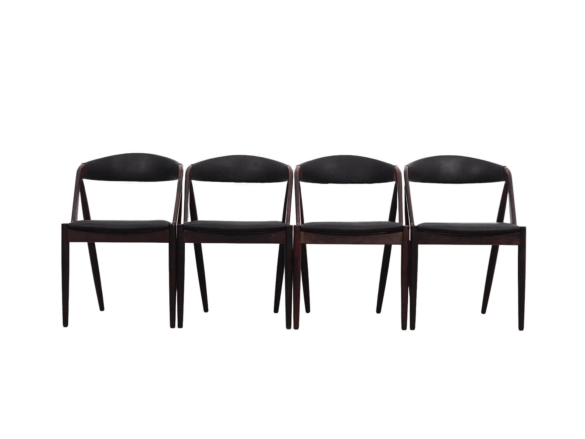 Komplet czterech krzeseł, palisander brązowy, skóra naturalna czarna, proj. K. Kristiansen, Dania, lata 70.