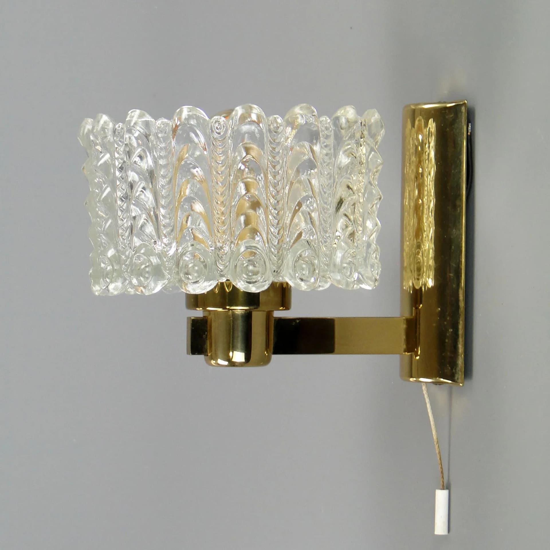 Wall light, transparent glass, brass, by C. Fagerlund, Orrefors, Sweden, 1960s. - 45356