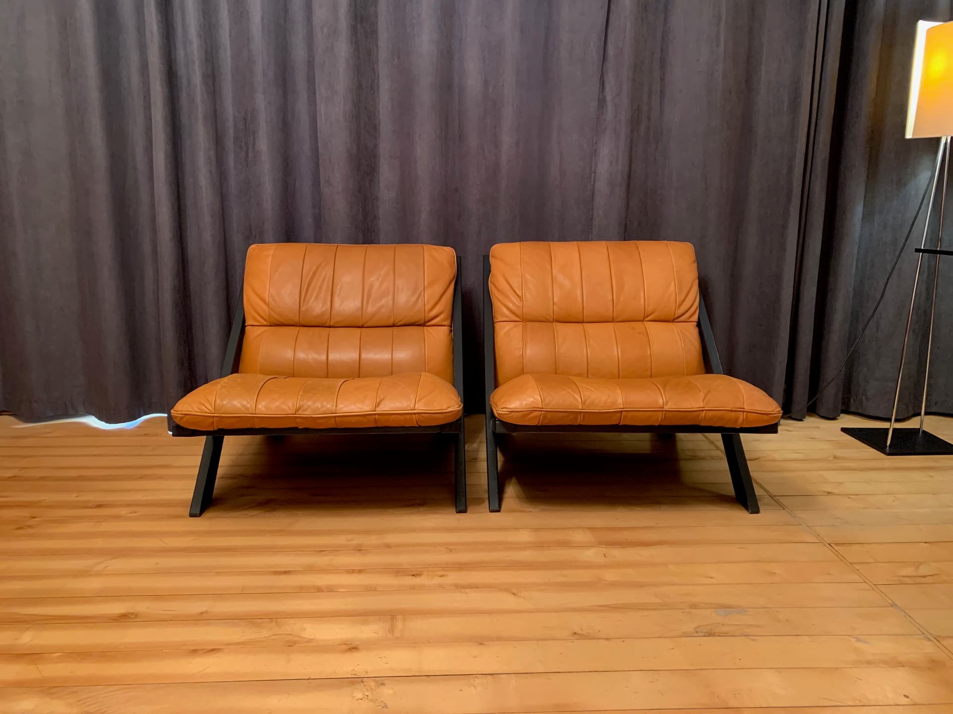 Pair of armchairs, cognac leather, dark brown wood, by U. Berger, de Sede, Switzerland, 1970s. - 45776