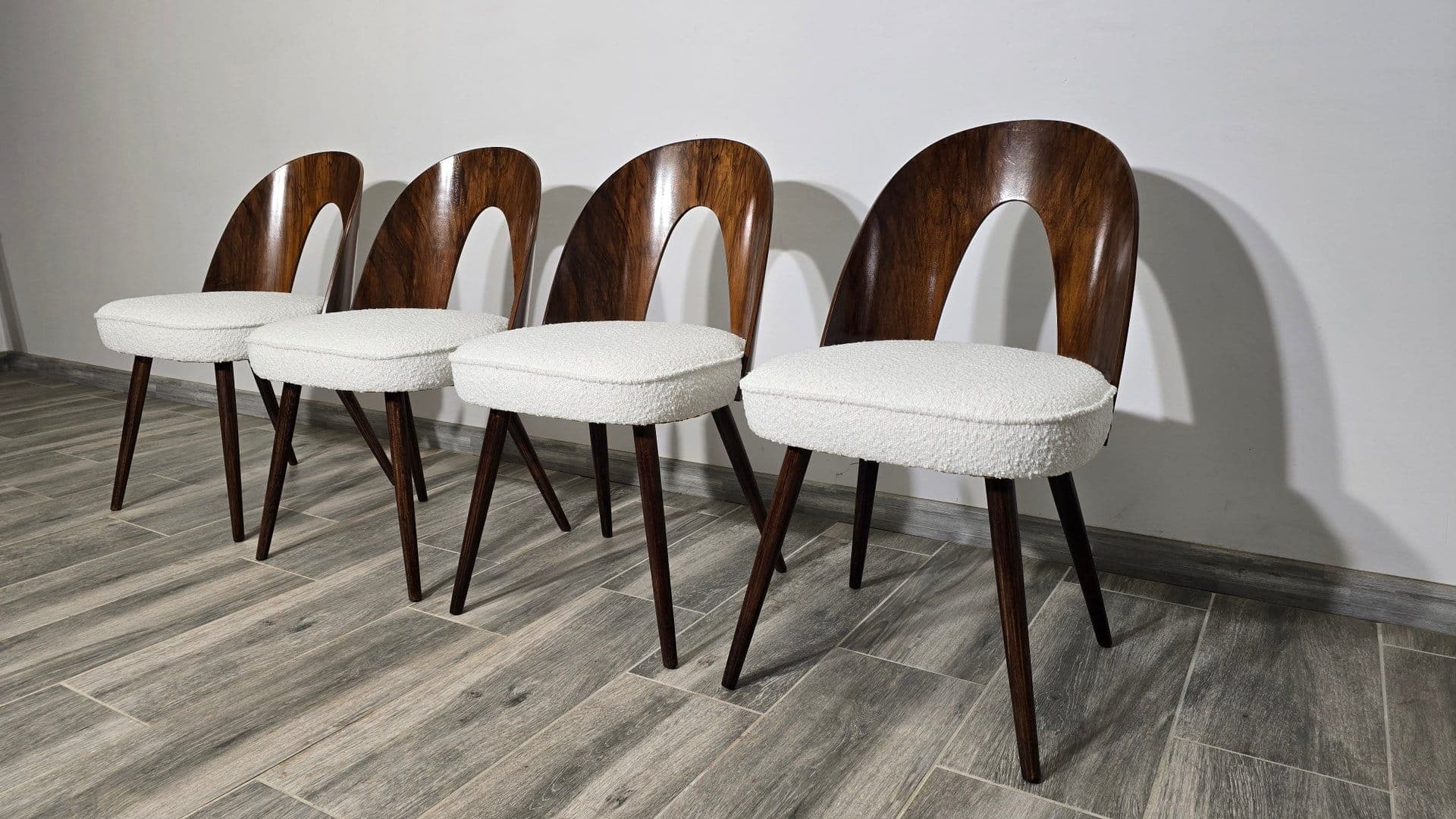 Set of four chairs, off-white bouclé, dark brown plywood, by A. Šuman, Tatra Nabytok, Czechoslovakia, 1960s. - 48234