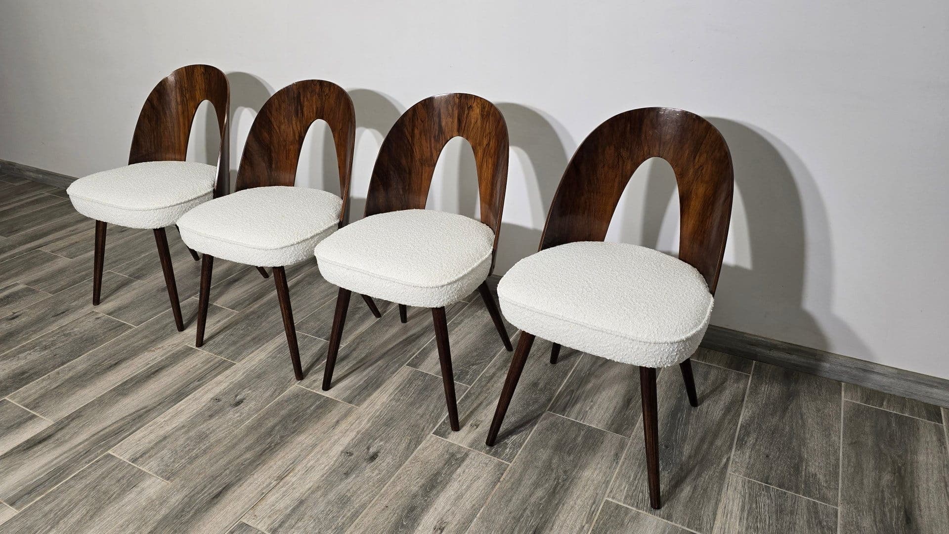Set of four chairs, off-white bouclé, dark brown plywood, by A. Šuman, Tatra Nabytok, Czechoslovakia, 1960s. - 48236