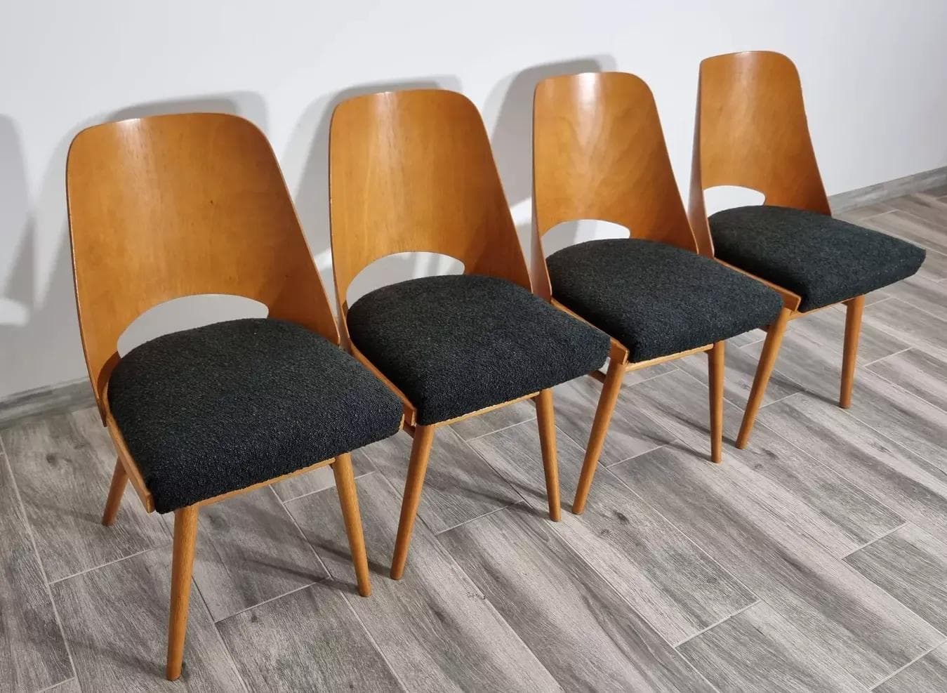 Set of four chairs, honey beech, black seat, by R. Hoffman, TON, Czechoslovakia, 1960s. - 48224