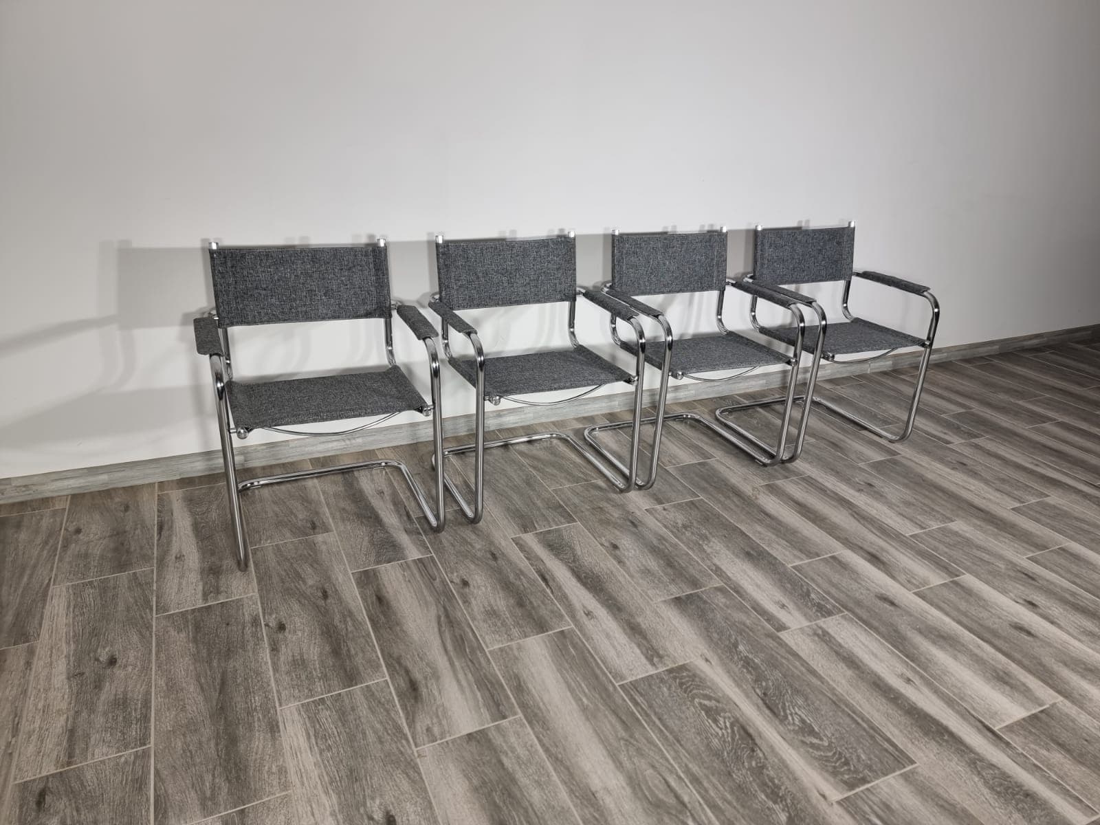Set of four chairs, Bauhaus style, chrome steel, grey, inspired by M. Breuer, 1950s. - 48215