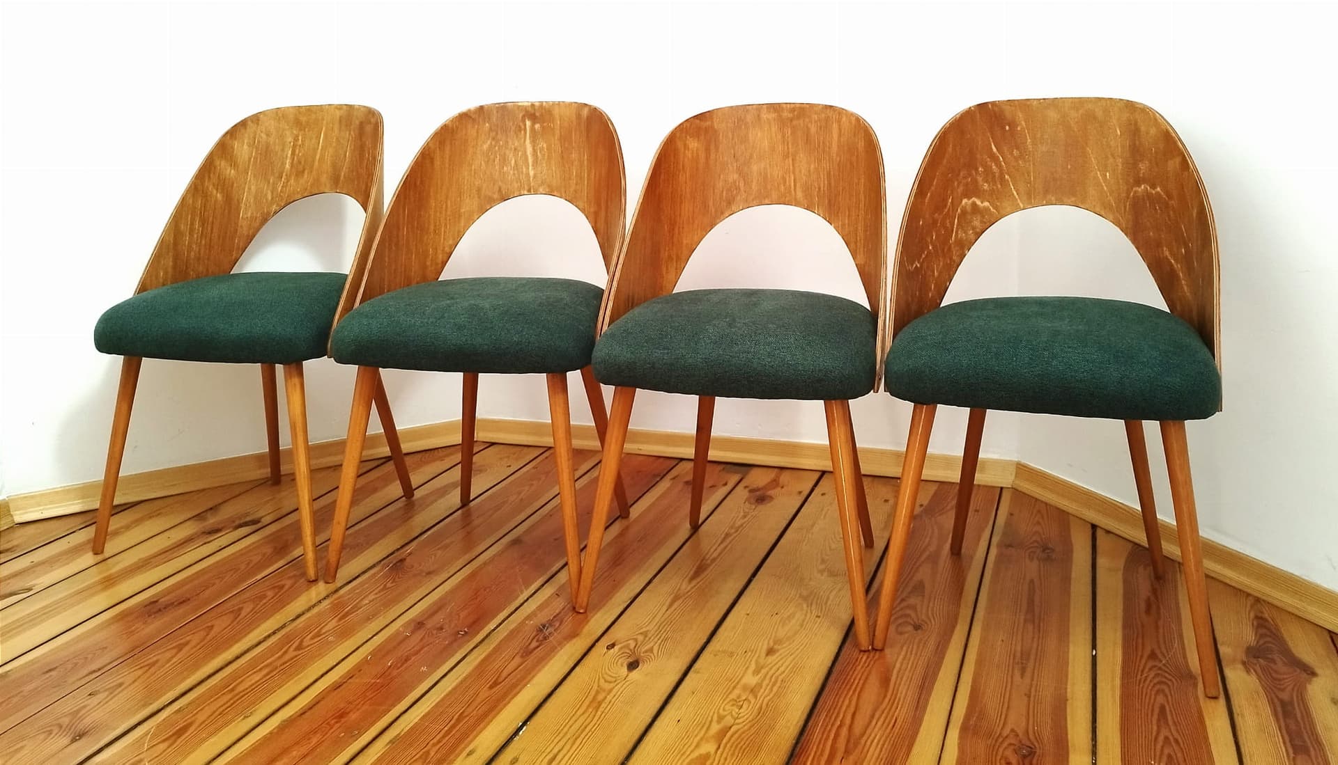 Set of four chairs, bottle green, plywood, by A. Suman, Tatra Nabytok, Czechoslovakia, 1960s. - 48212