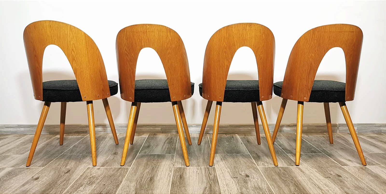 Set of four chairs, brown oak, black fabric, by A. Šuman, Tatra Nabytok, Czechoslovakia, 1960s. - 48148