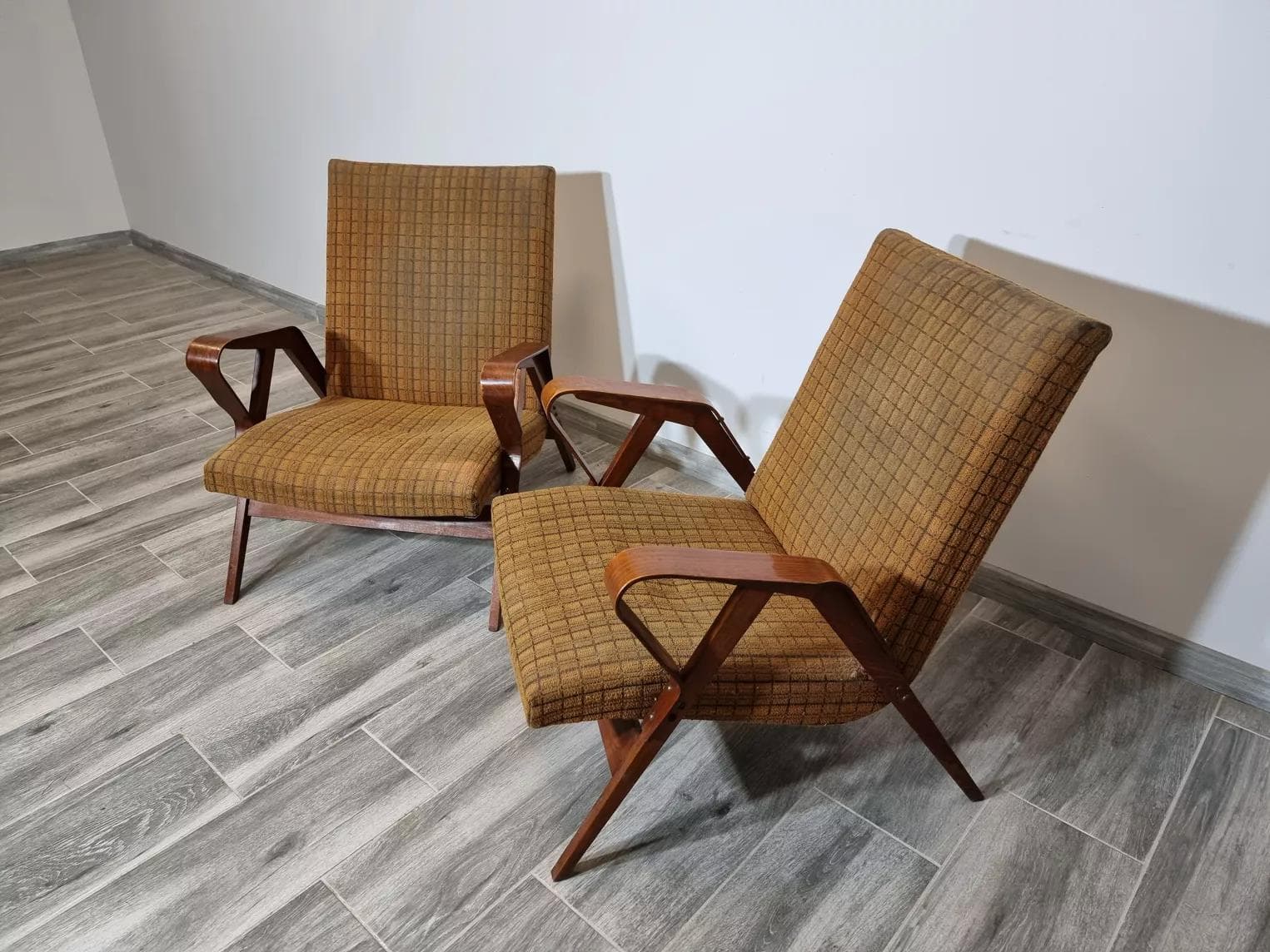 Pair of armchairs, dark brown plywood, by F. Jirak, Tatra Nabytok, Czechoslovakia, 1960s. - 48830